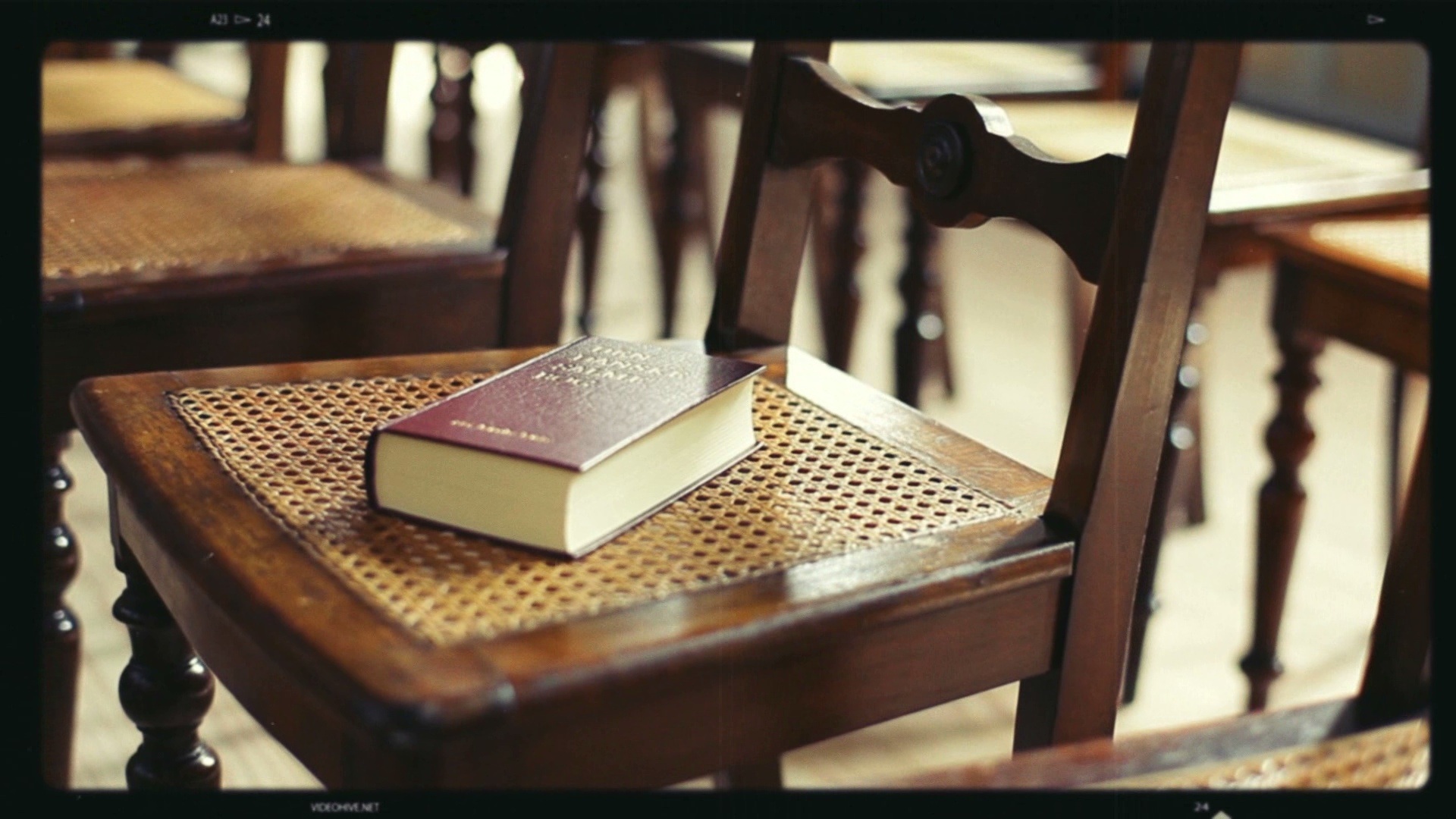Bible on a wooden chair in a church free image download