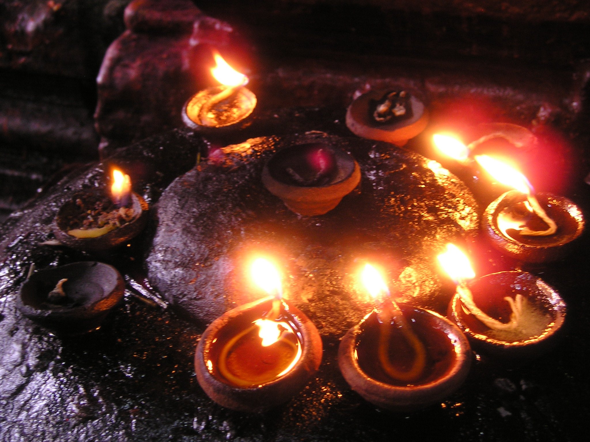 Prayer candles in darkness, india, madurai free image download