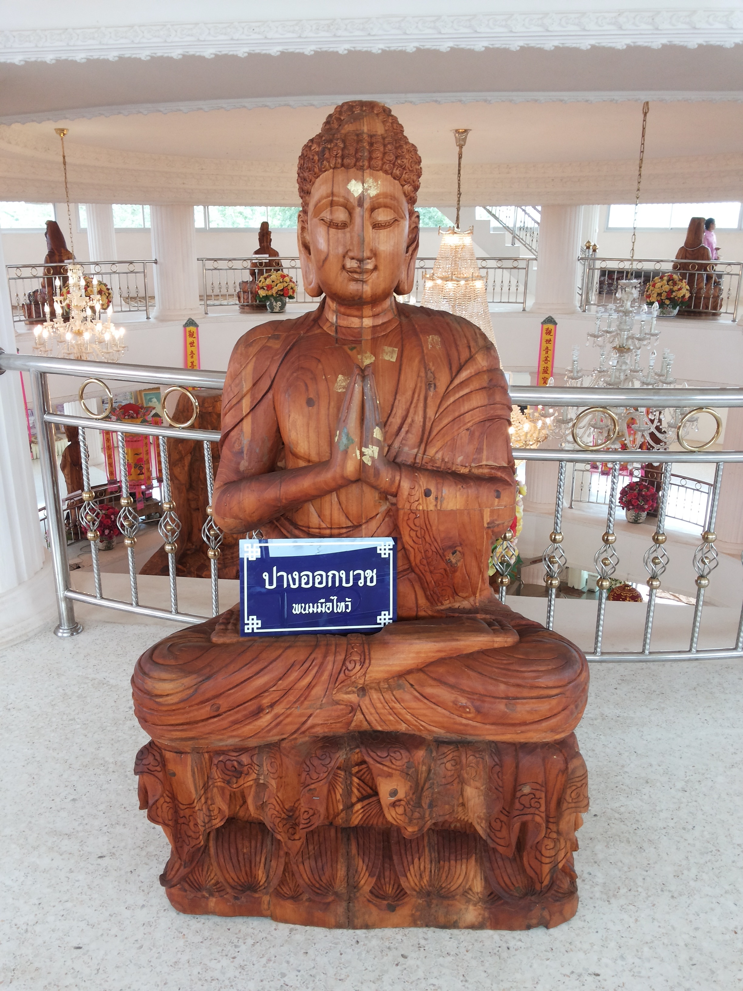 Buddha statue in building, wood carving free image download
