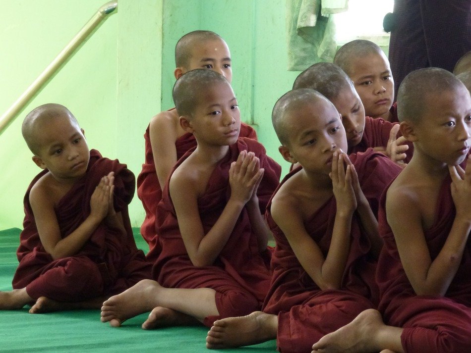 Singing monks in a Buddhist temple free image download