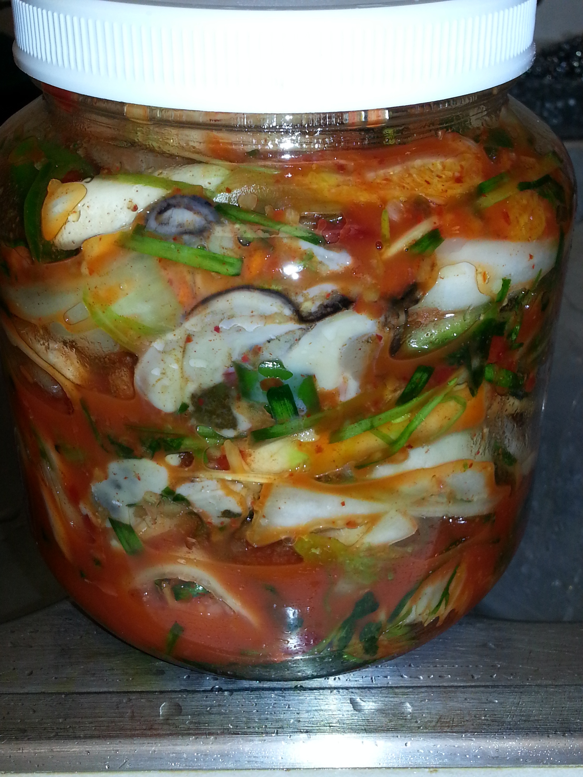 Kimchi with oysters in a jar closeup free image download