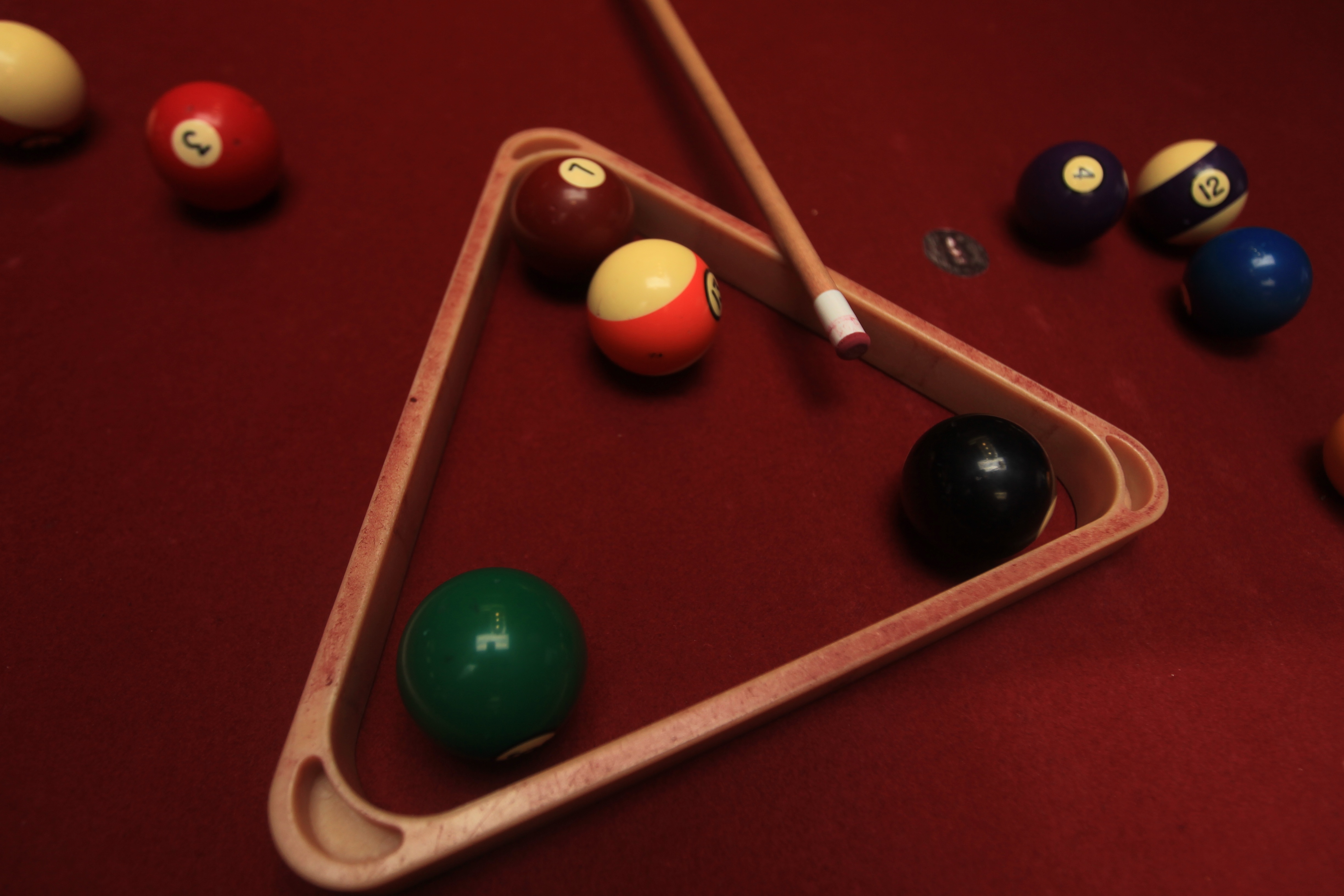 Billiards equipment rack, cue and balls on table free image download