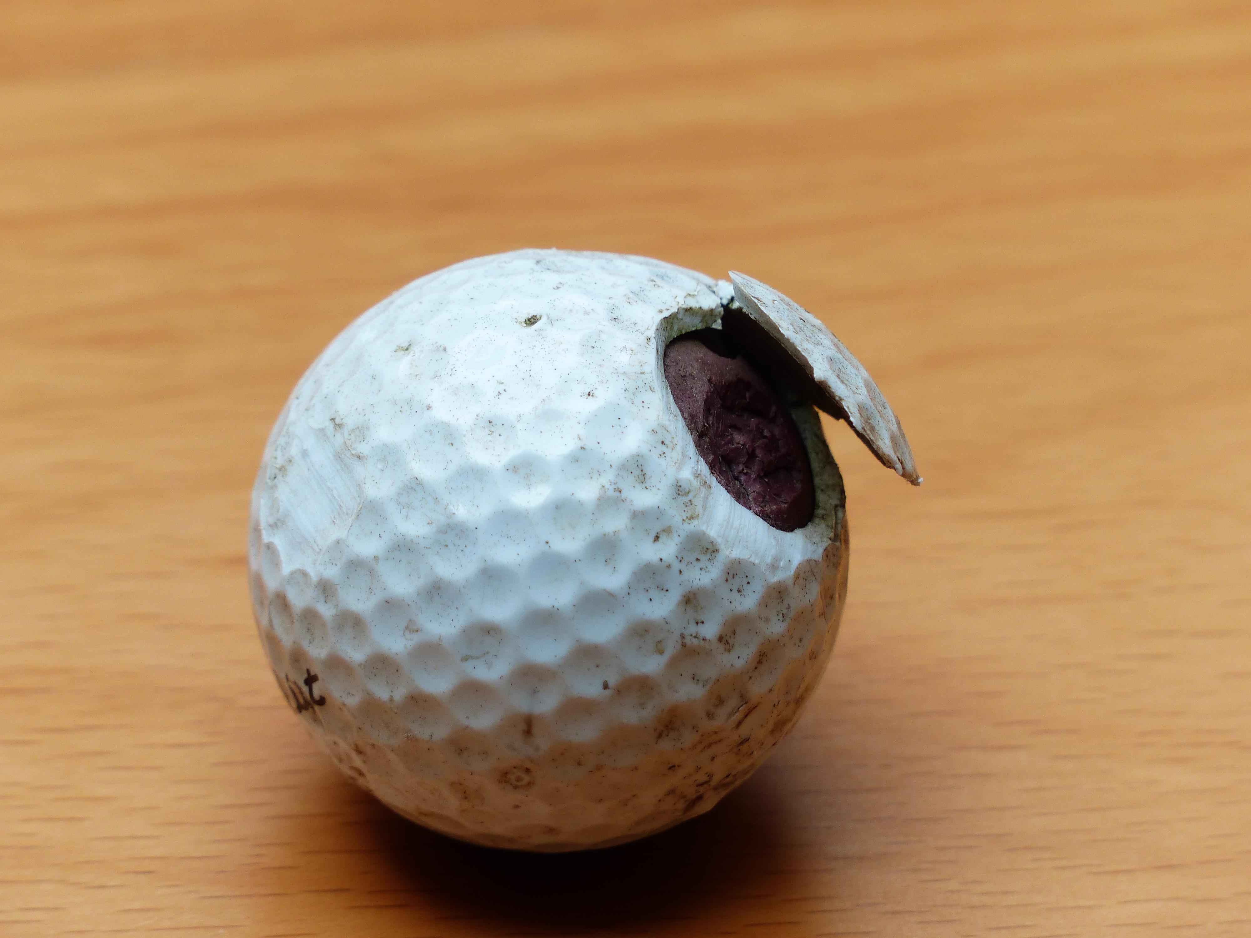 Damaged golf ball free image download