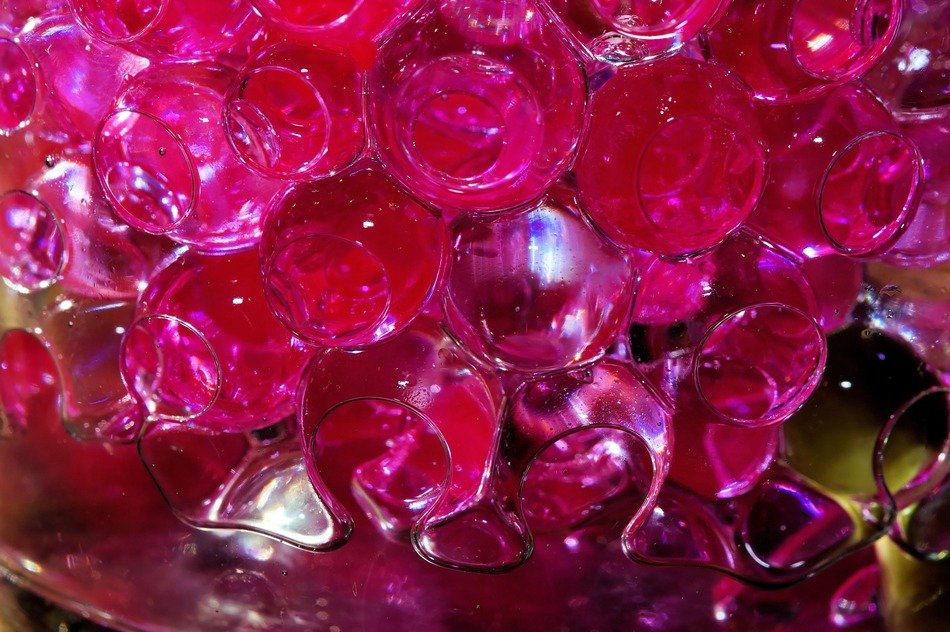 Pink glass balls in water free image download