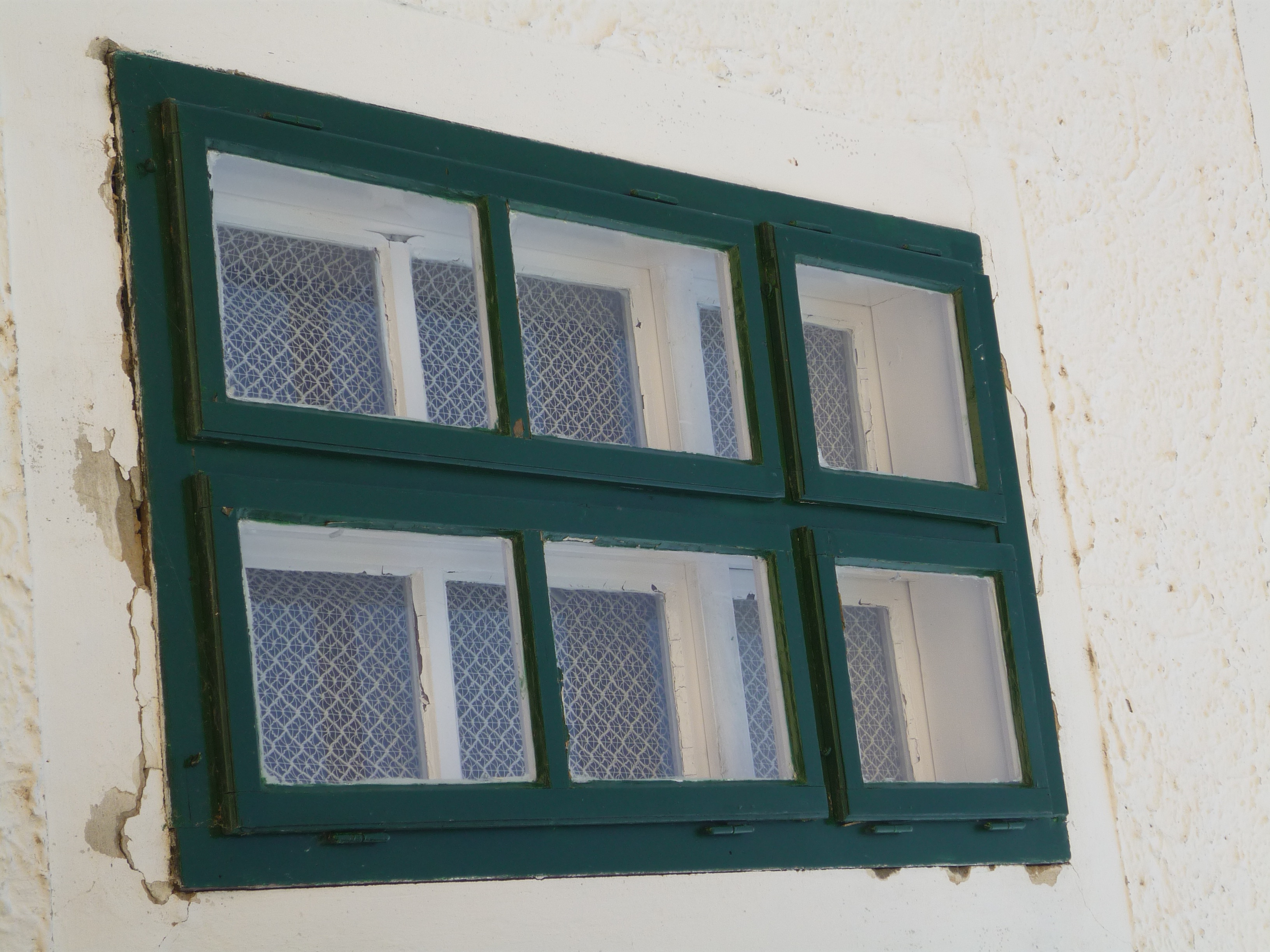 Window with white frame on a white wall closeup free image download