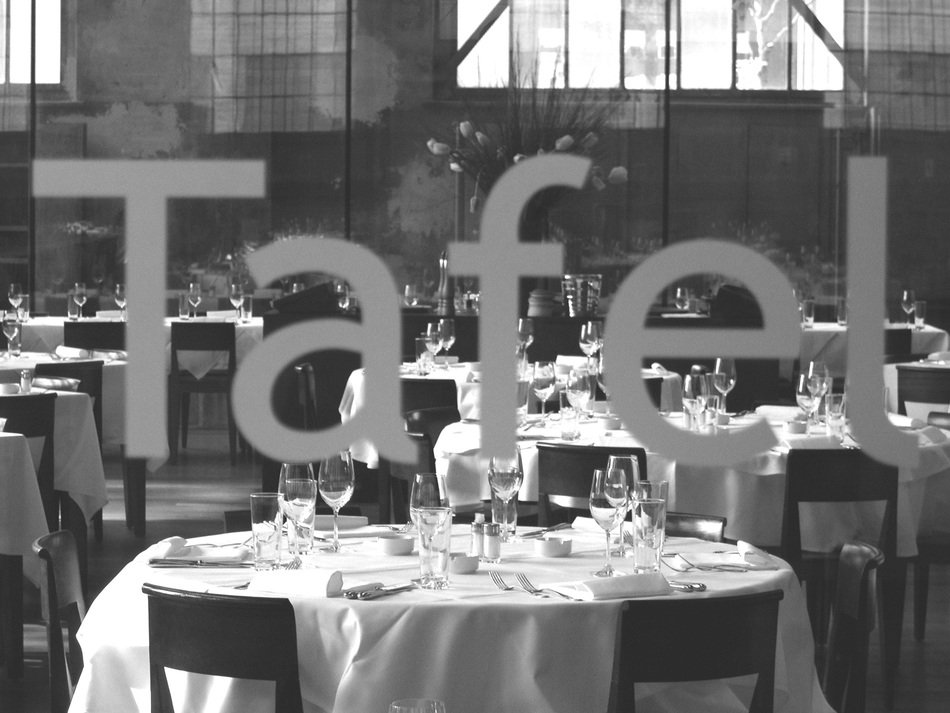 Black and white photo of a table in a restaurant free image download