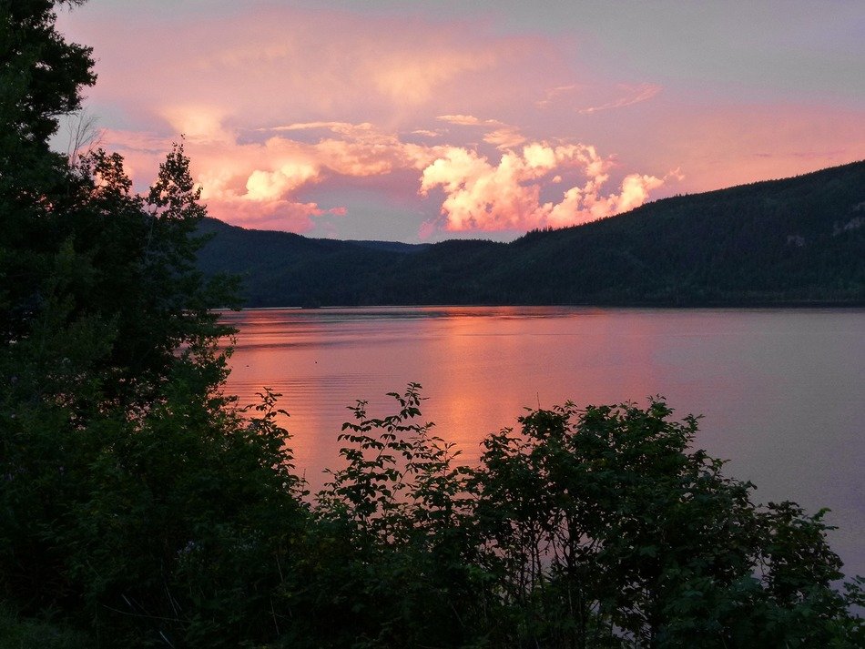 Thunderstorm clouds above canim lake at sunset, canada, british columbia free image download