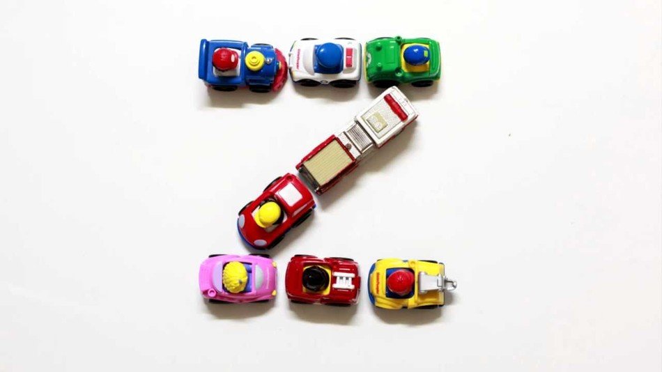 Folded letter from toy cars free image download