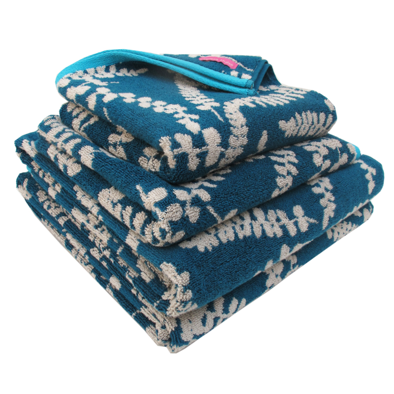 Three blue towels in a stack free image download