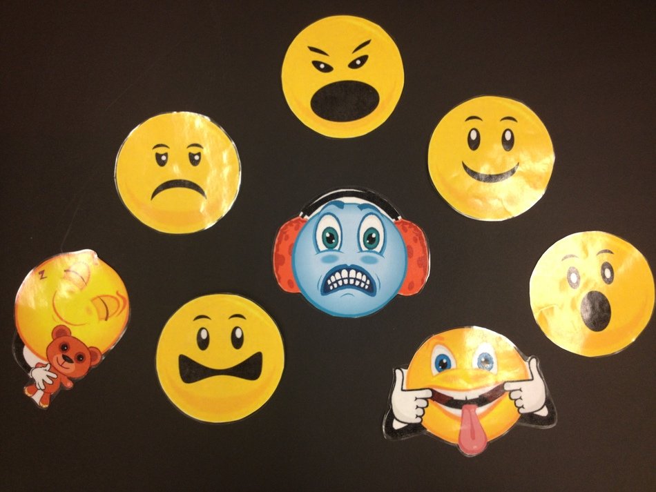 Emoticons on a black background free image download