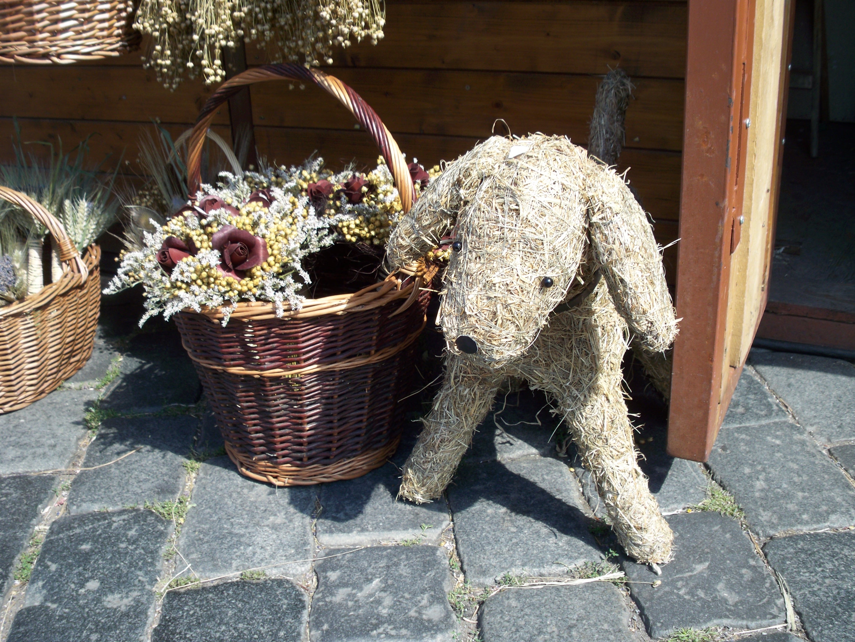 Straw dog near the basket free image download