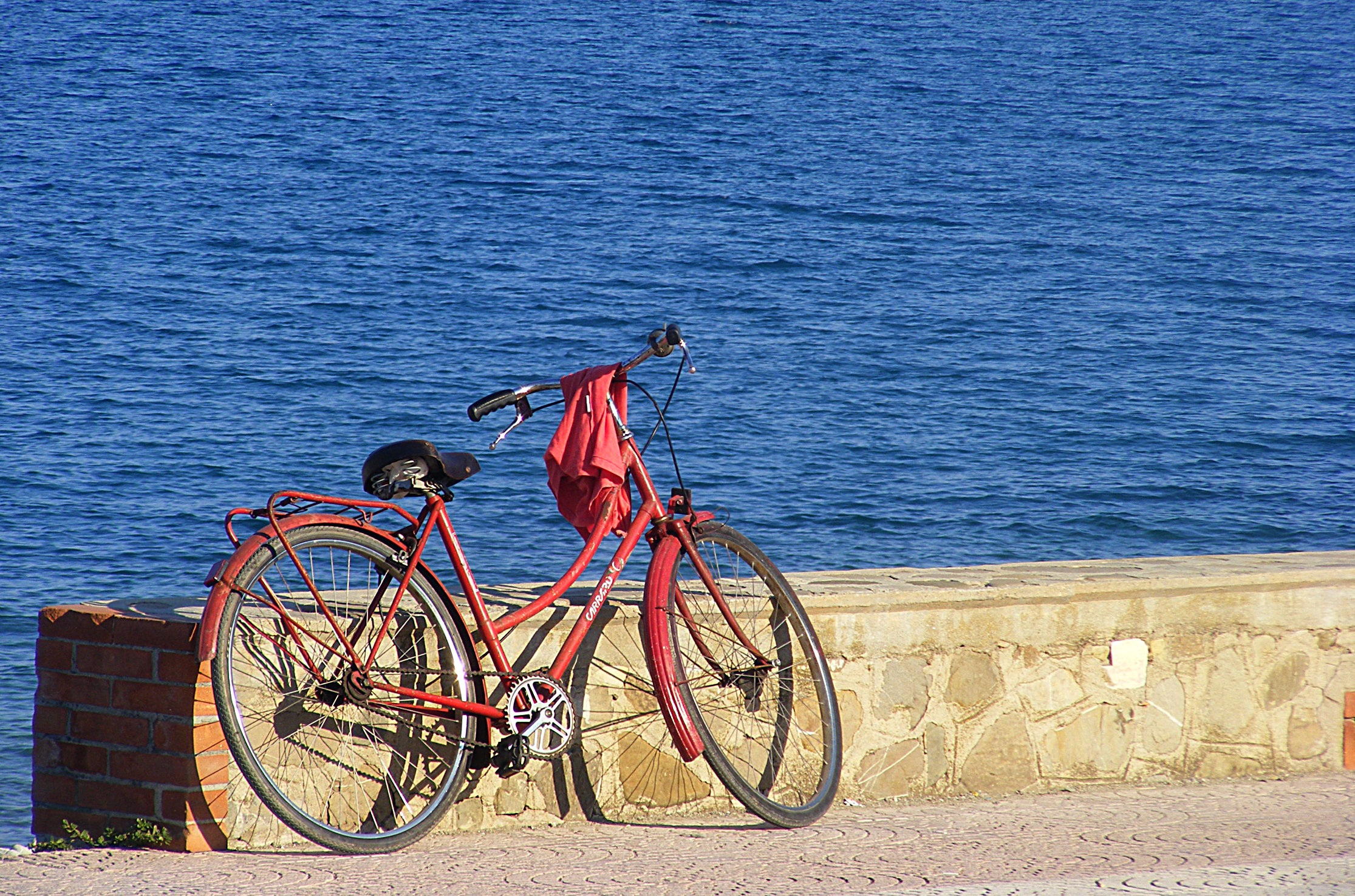 Red Bicycle by the water, montegiordano marine free image download