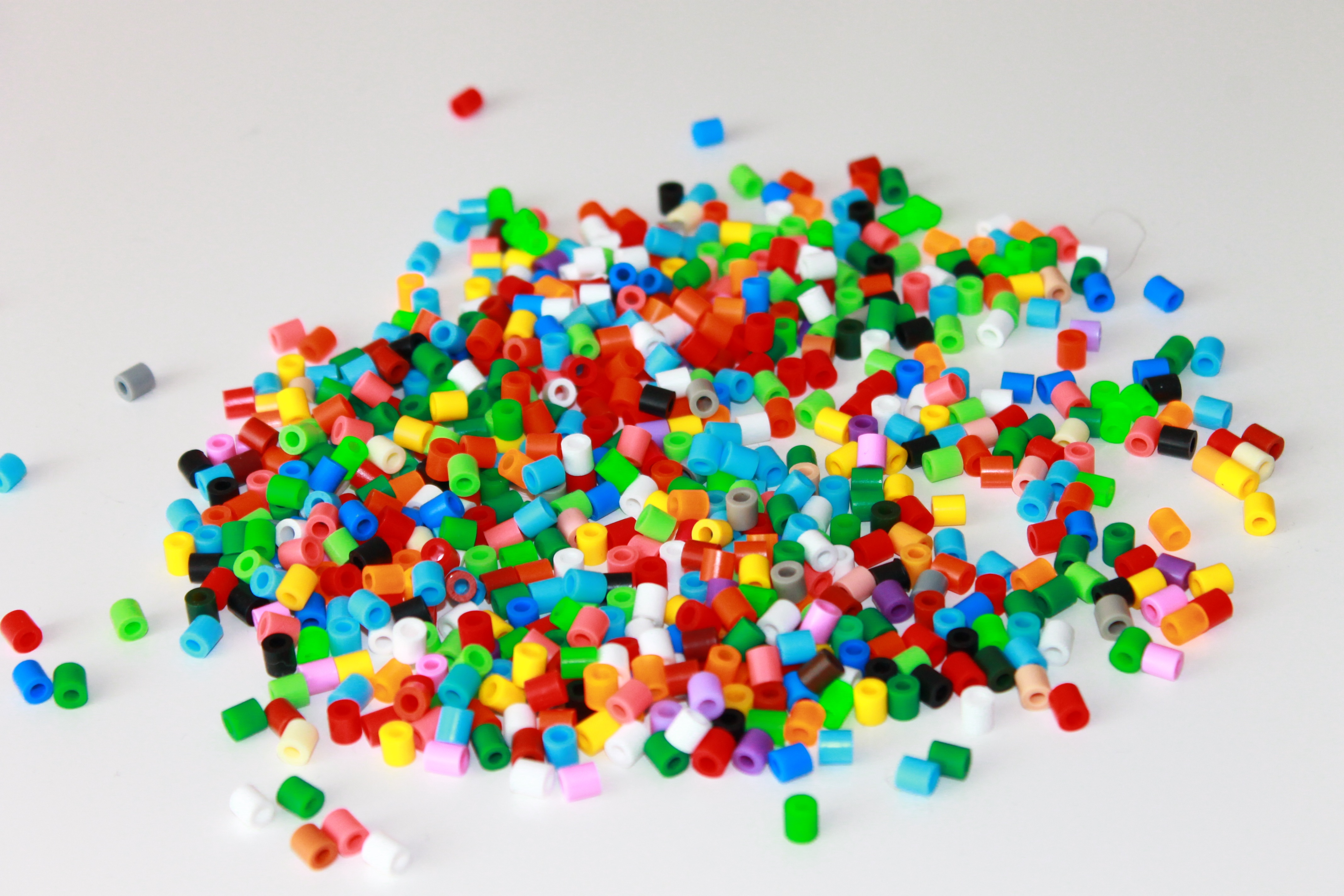 Pile of colorful ironing beads free image download