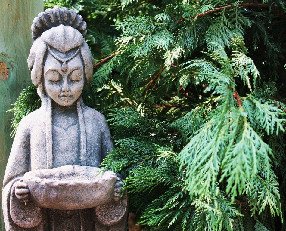 Decorative oriental statue in the garden free image download