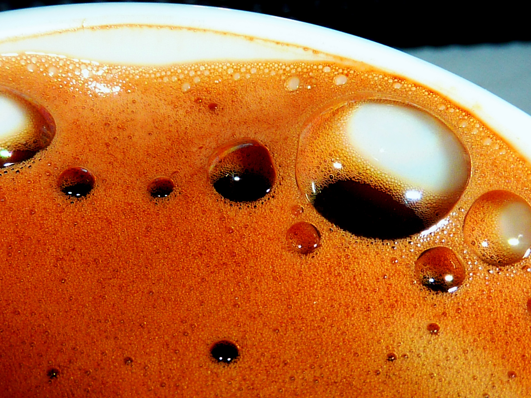 Closeup photo of orange coffee foam free image download