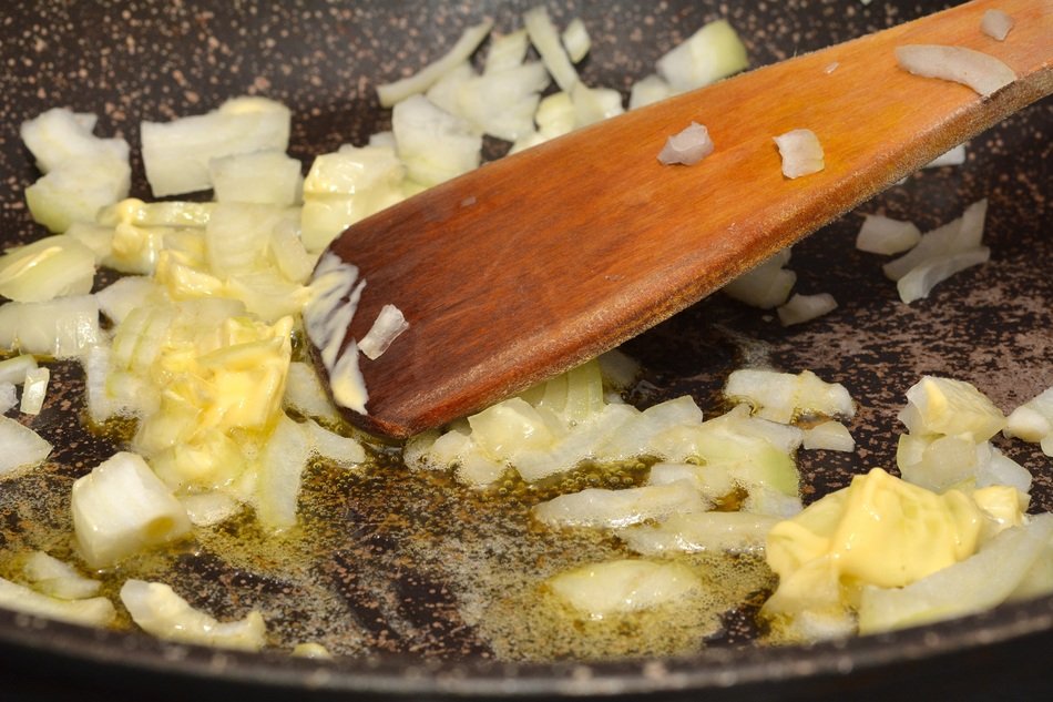 Chopped onions fried in a frying pan free image download
