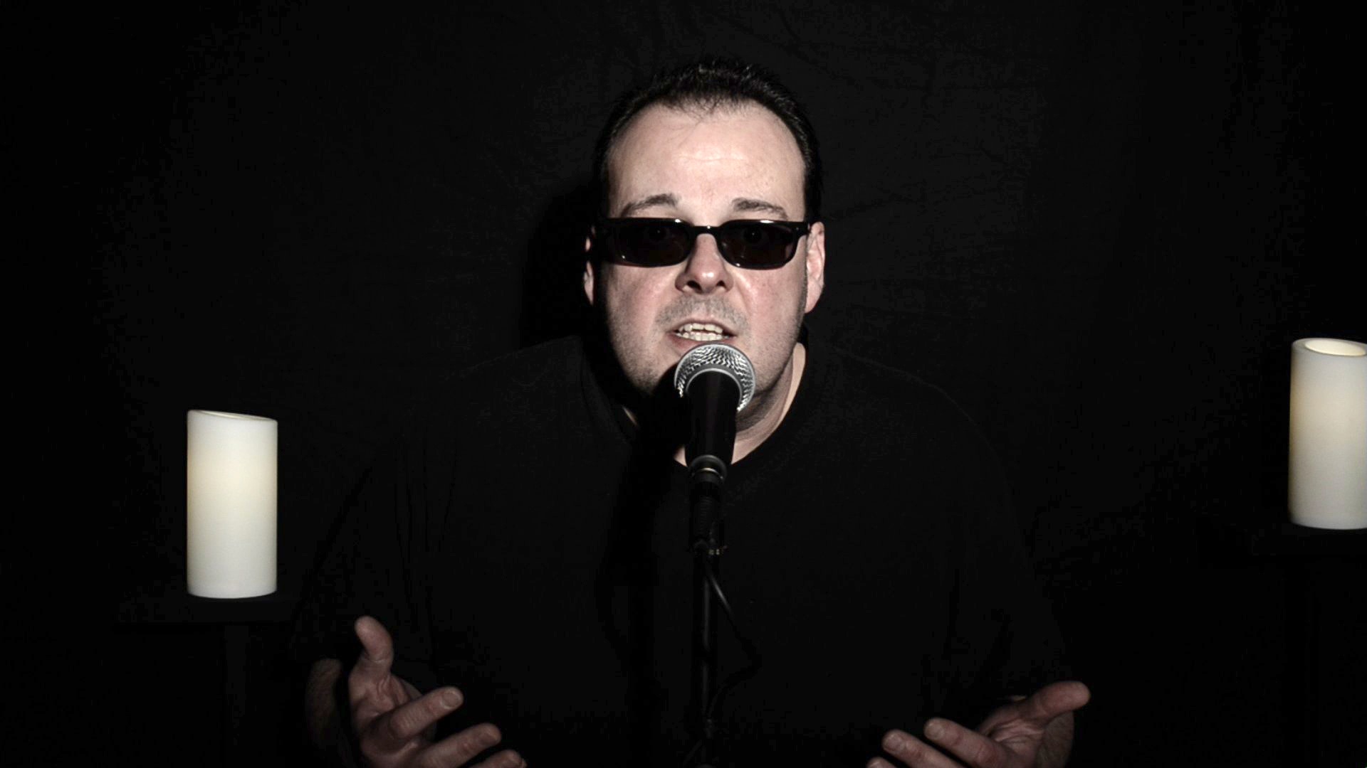 Singer in sunglasses on stage free image download