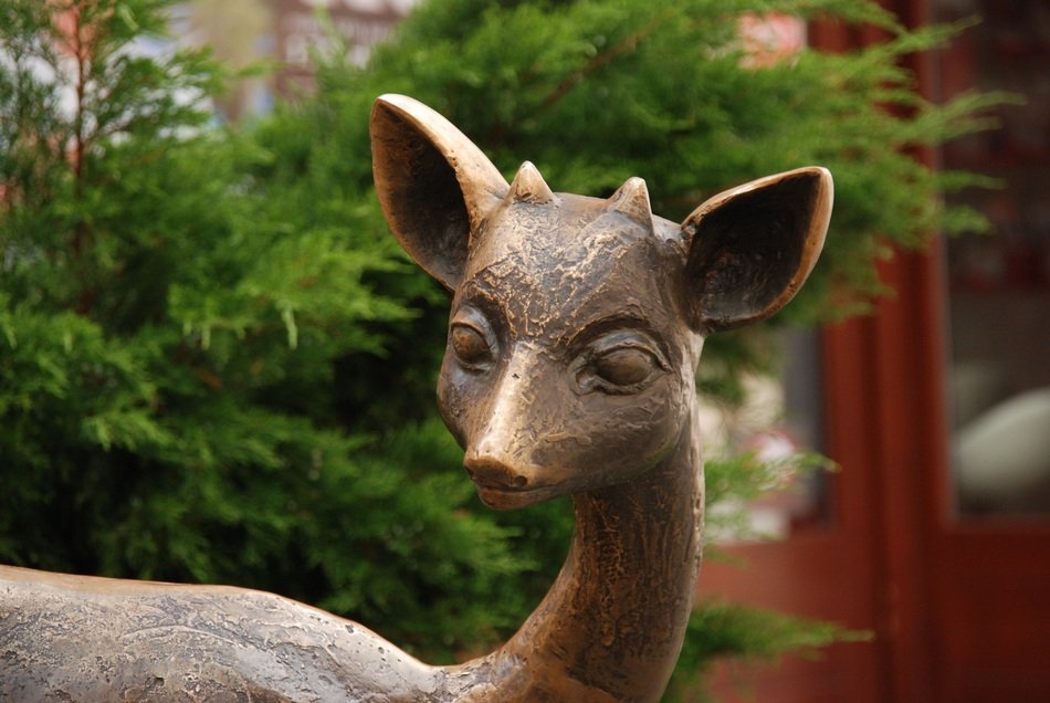 Copper statue of deer free image download