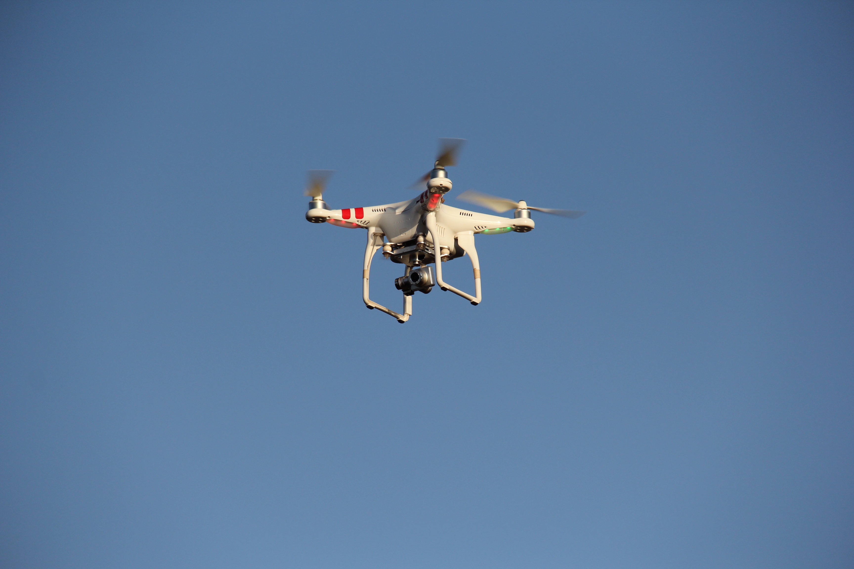 Drone high in the blue sky free image download