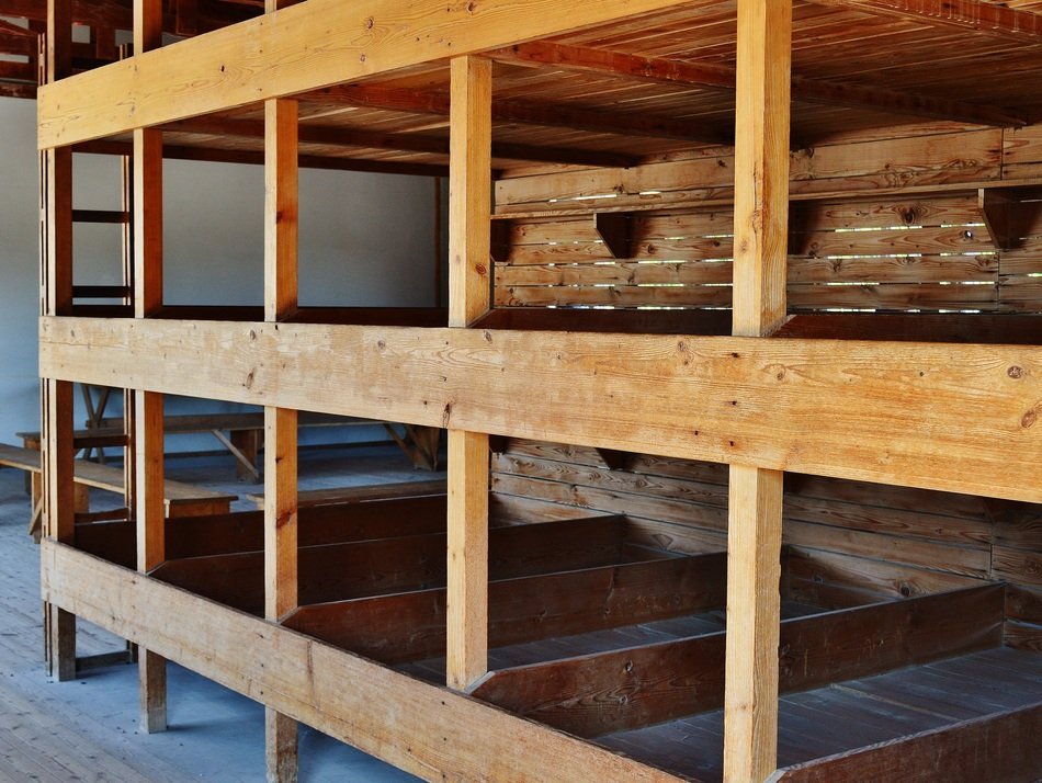 Wooden beds in three floors in a concentration camp free image download
