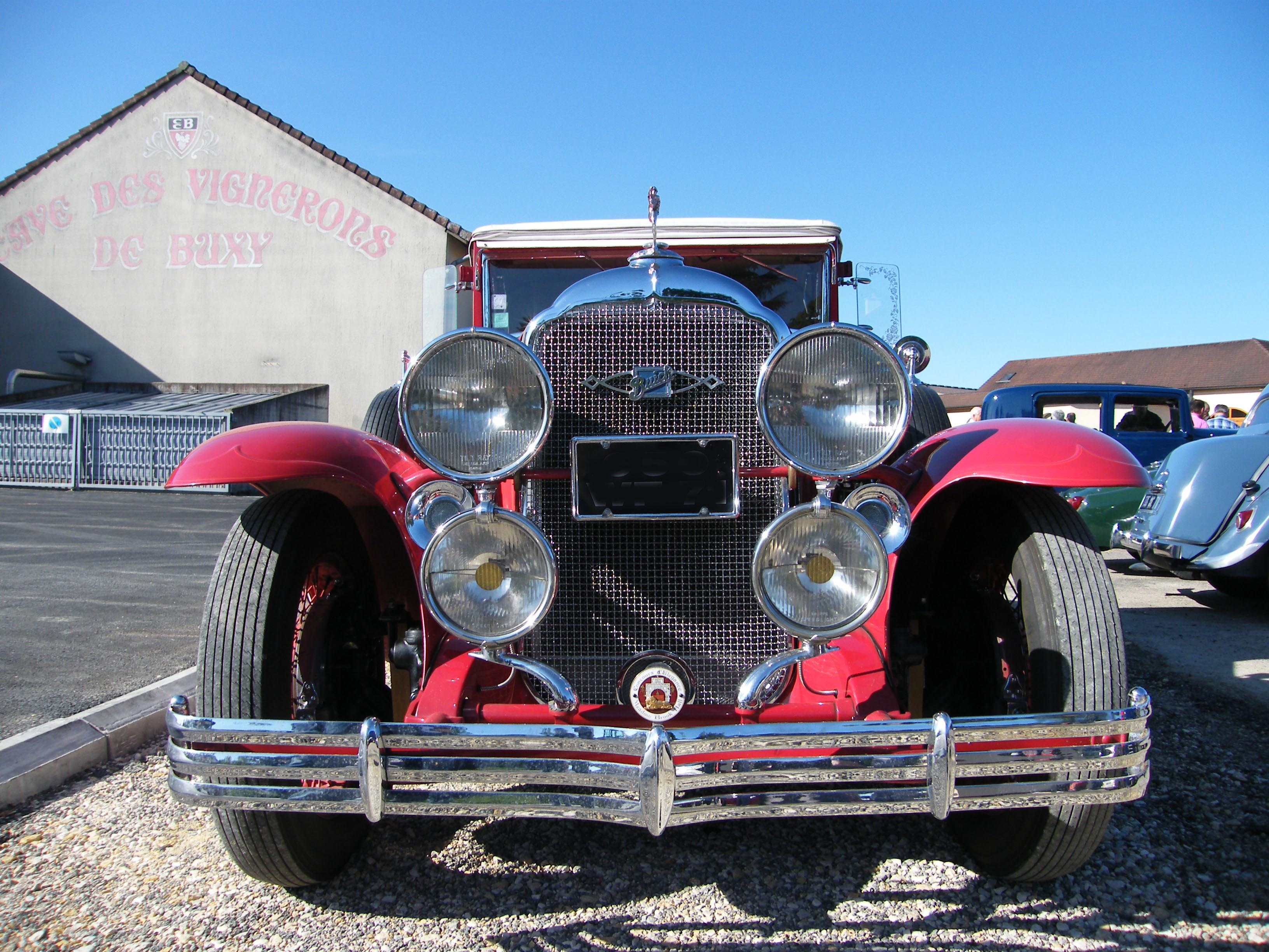 Red vintage car with round headlights free image download