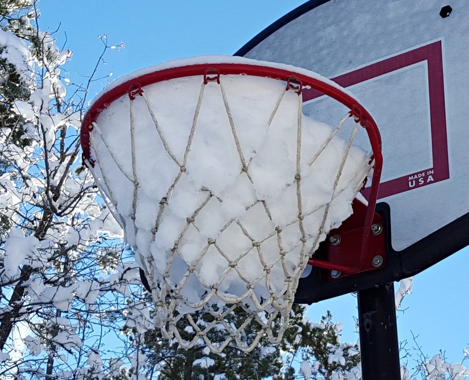 Snow in the basketball hoop in winter free image download