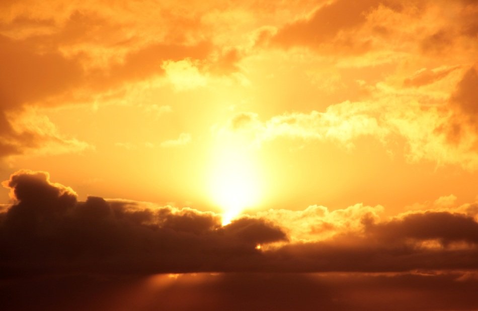 Bright yellow sunset in hills free image download