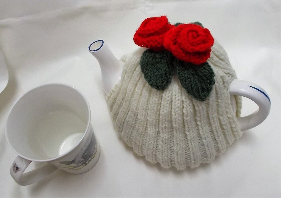 Hand knitted Cream tea cosy with red flowers fits a 4 6 cup tea pot free image download