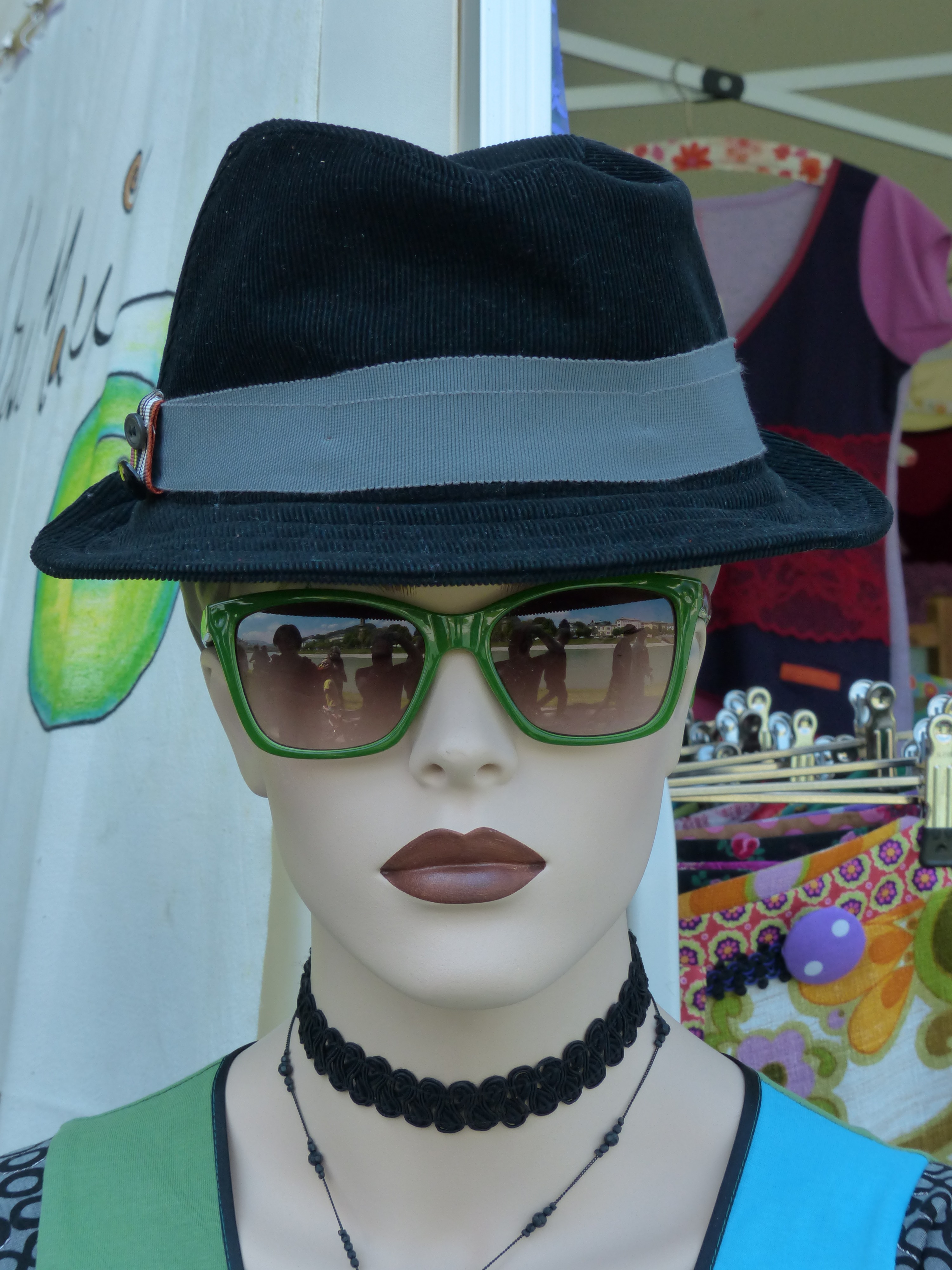 Sunglasses and hat on a mannequin head free image download