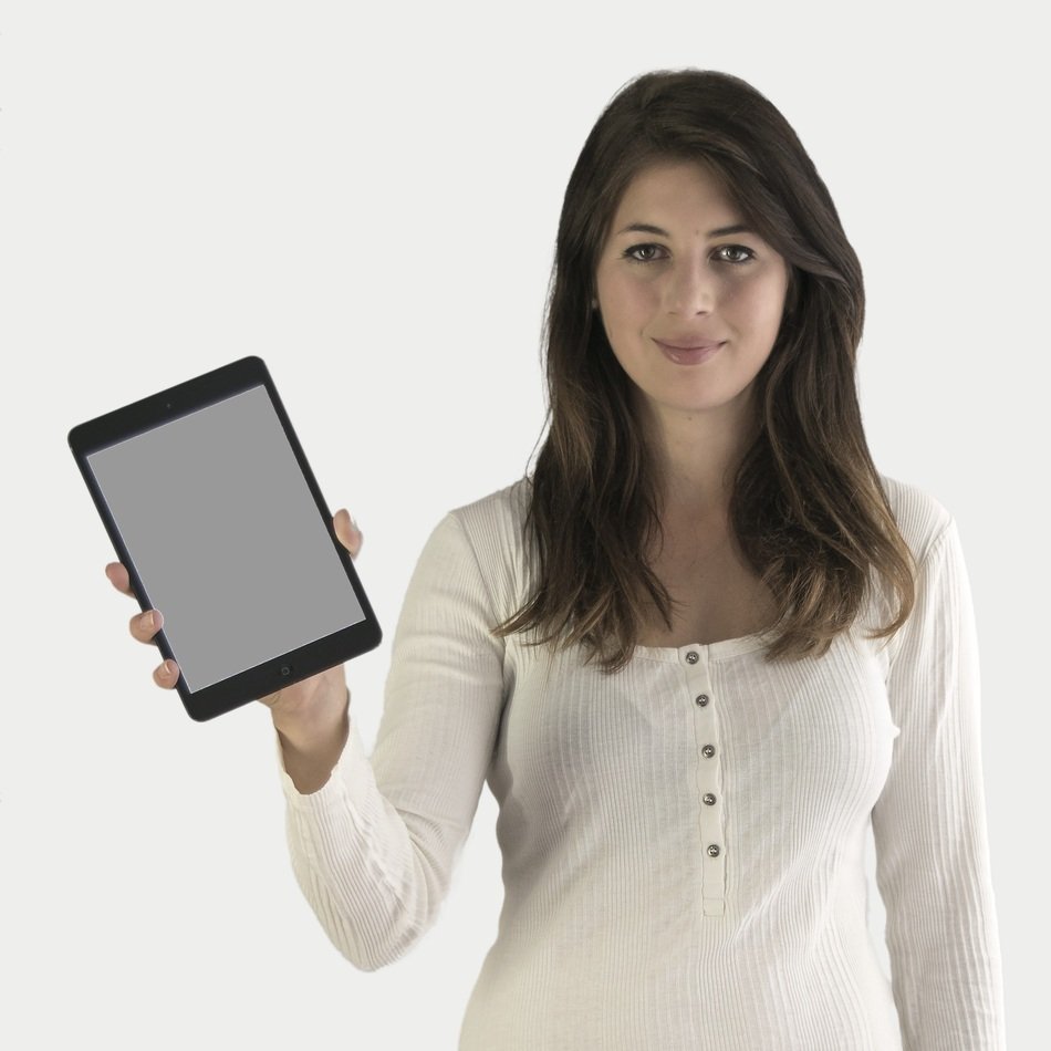 Woman presenting ipad free image download