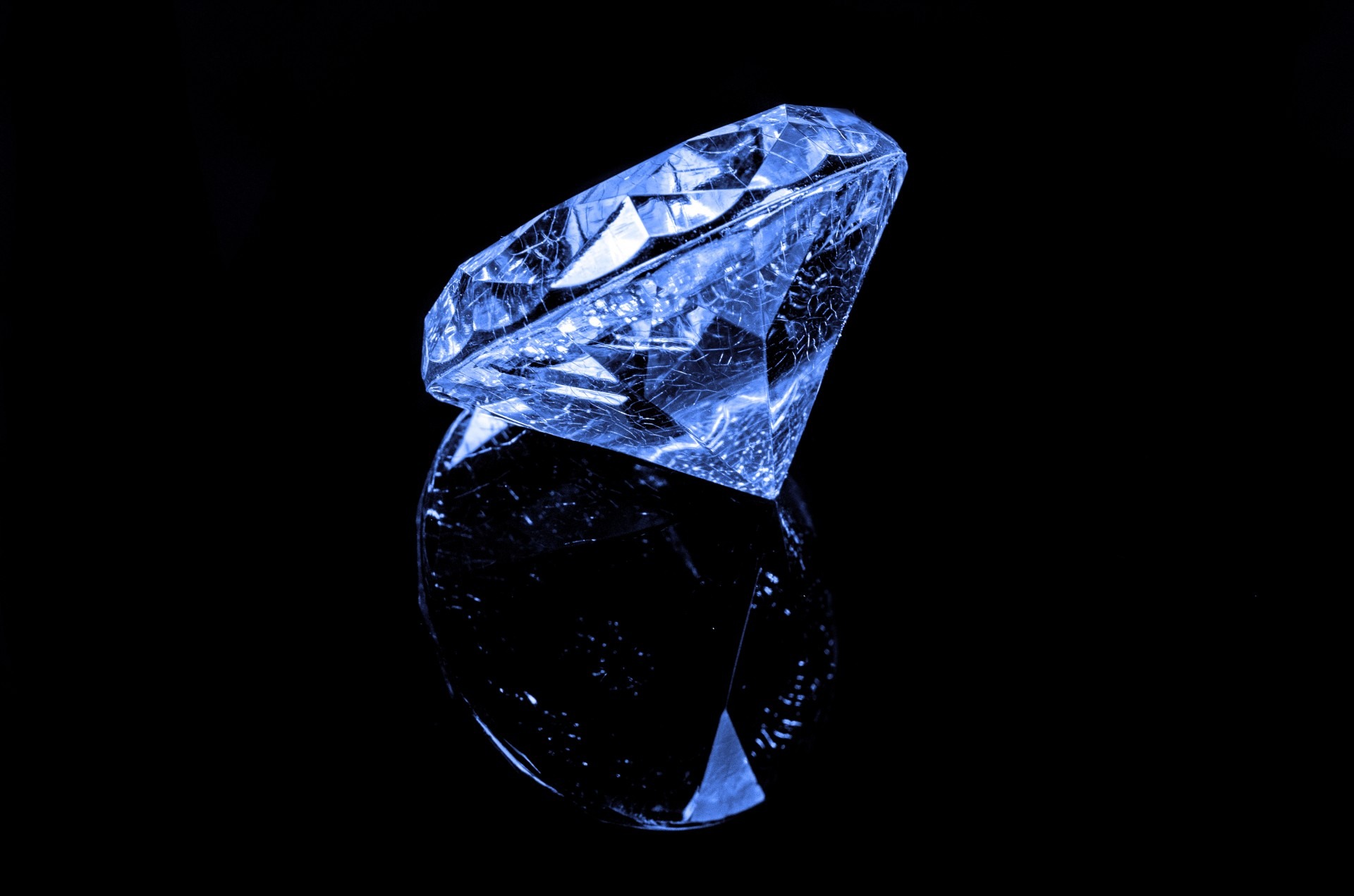 Beautiful blue diamond on the black background free image download