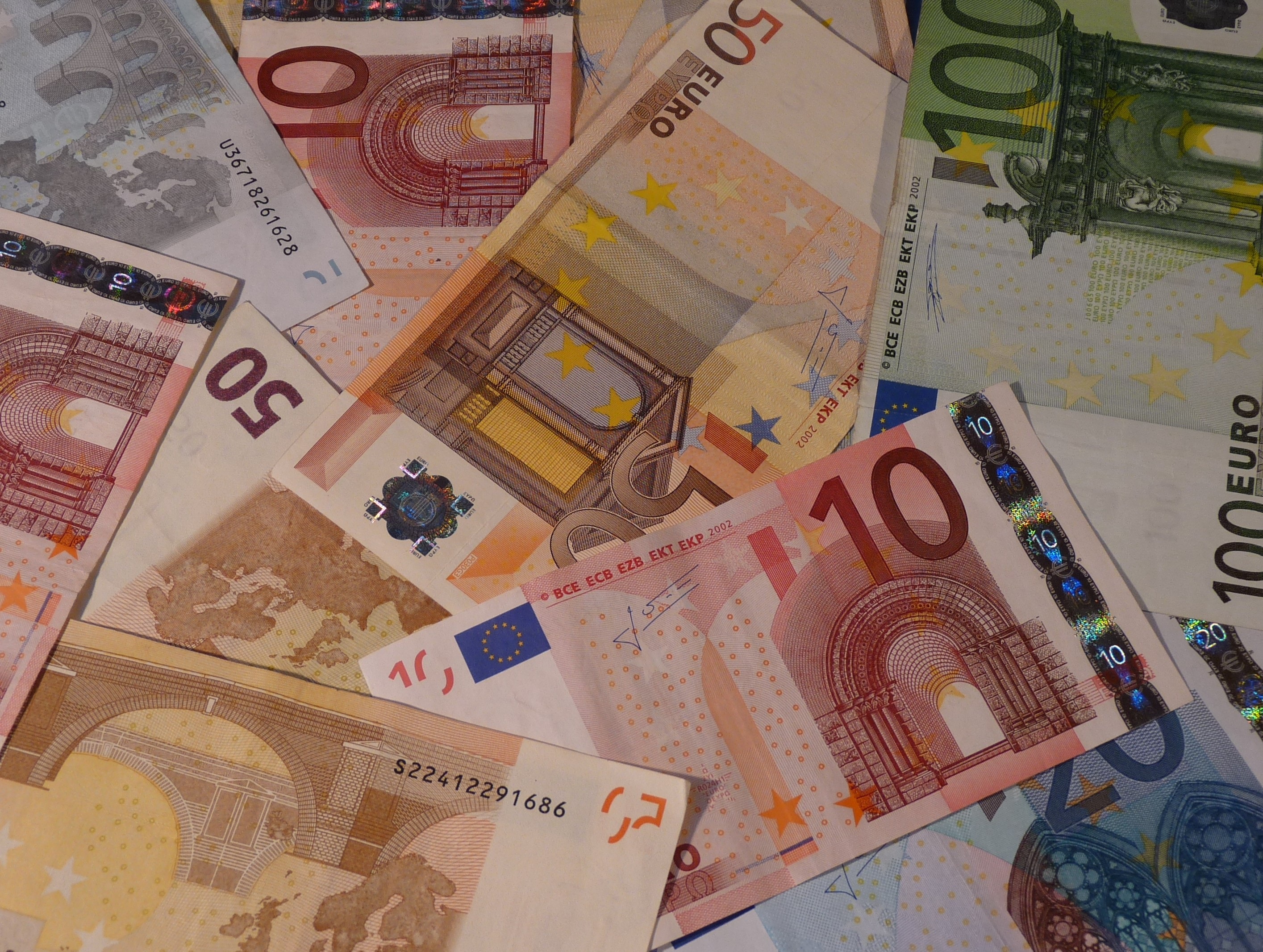 Colorful Euro banknotes of different values, with images free image
