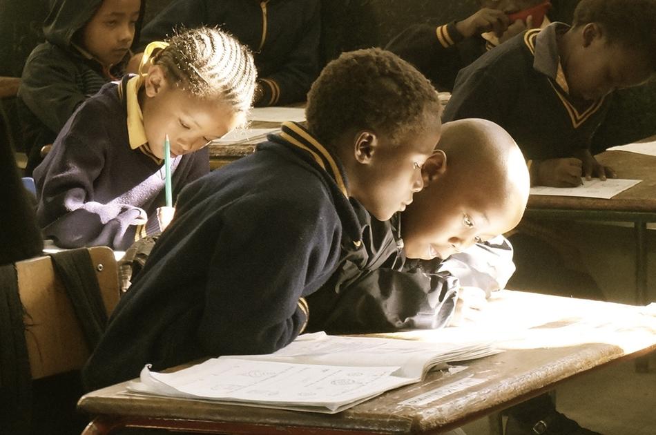 African children at school desks free image download