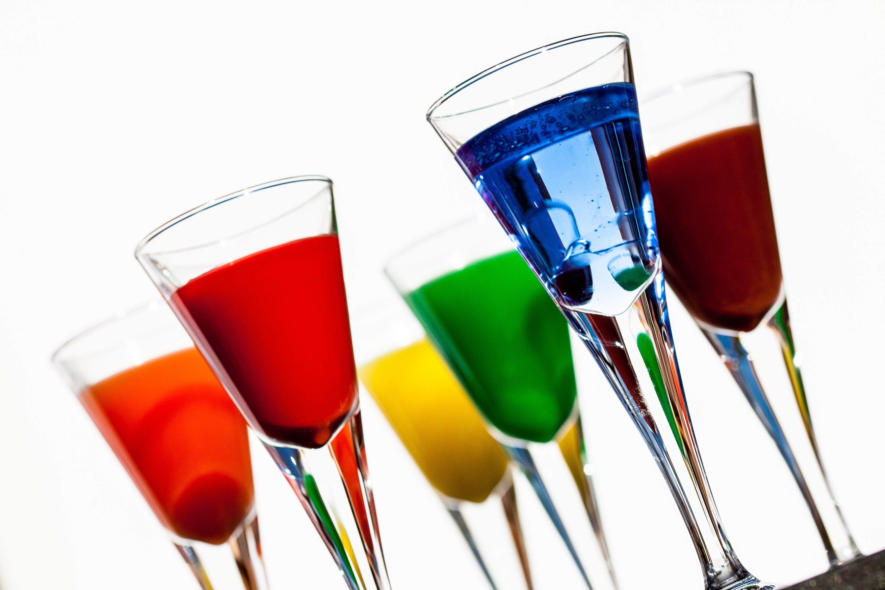 Multicolored drinks in tall glasses free image download