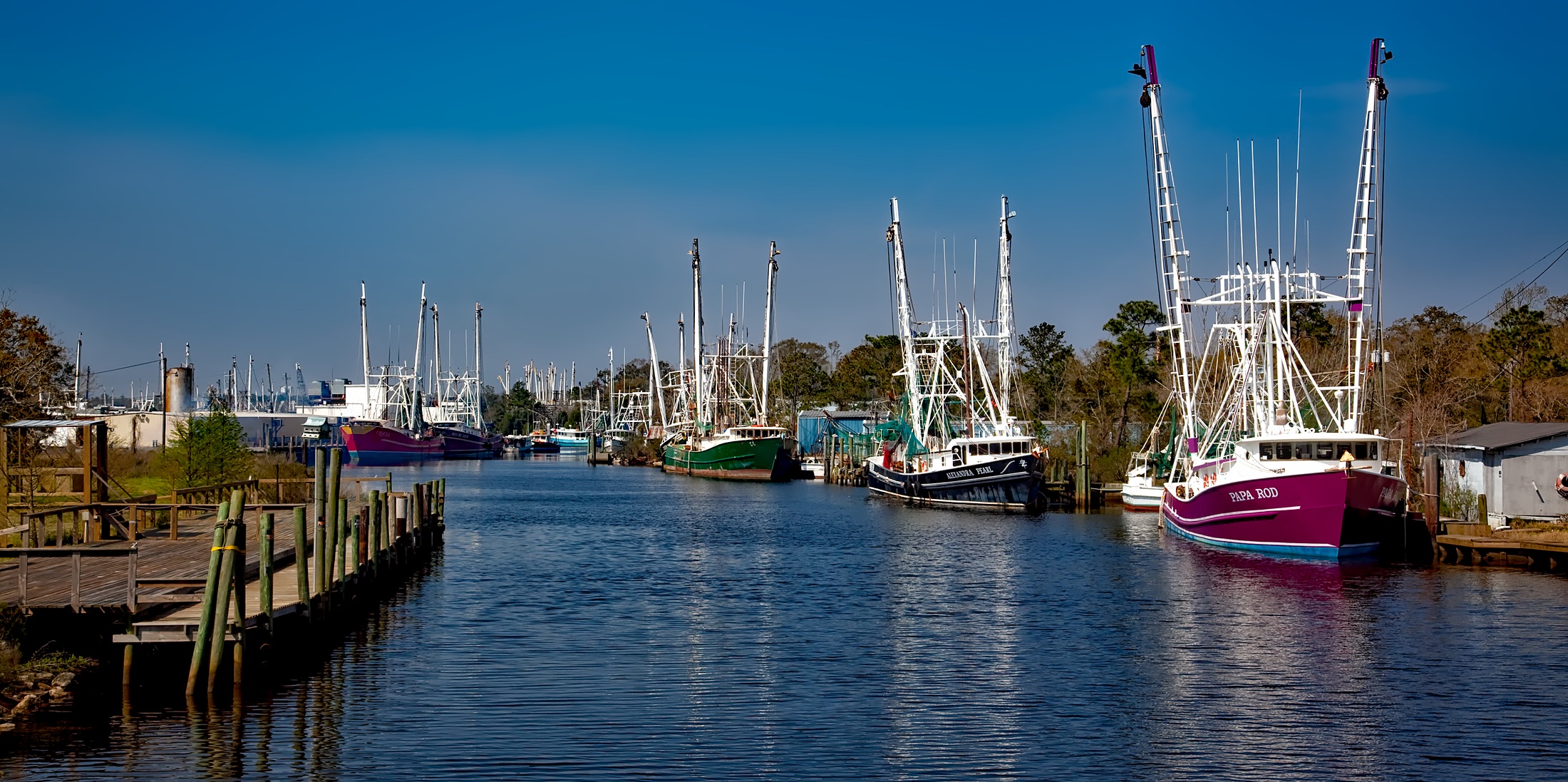 Colorful boats on the beautiful Bayou La Batre bay in Alabama, USA free
