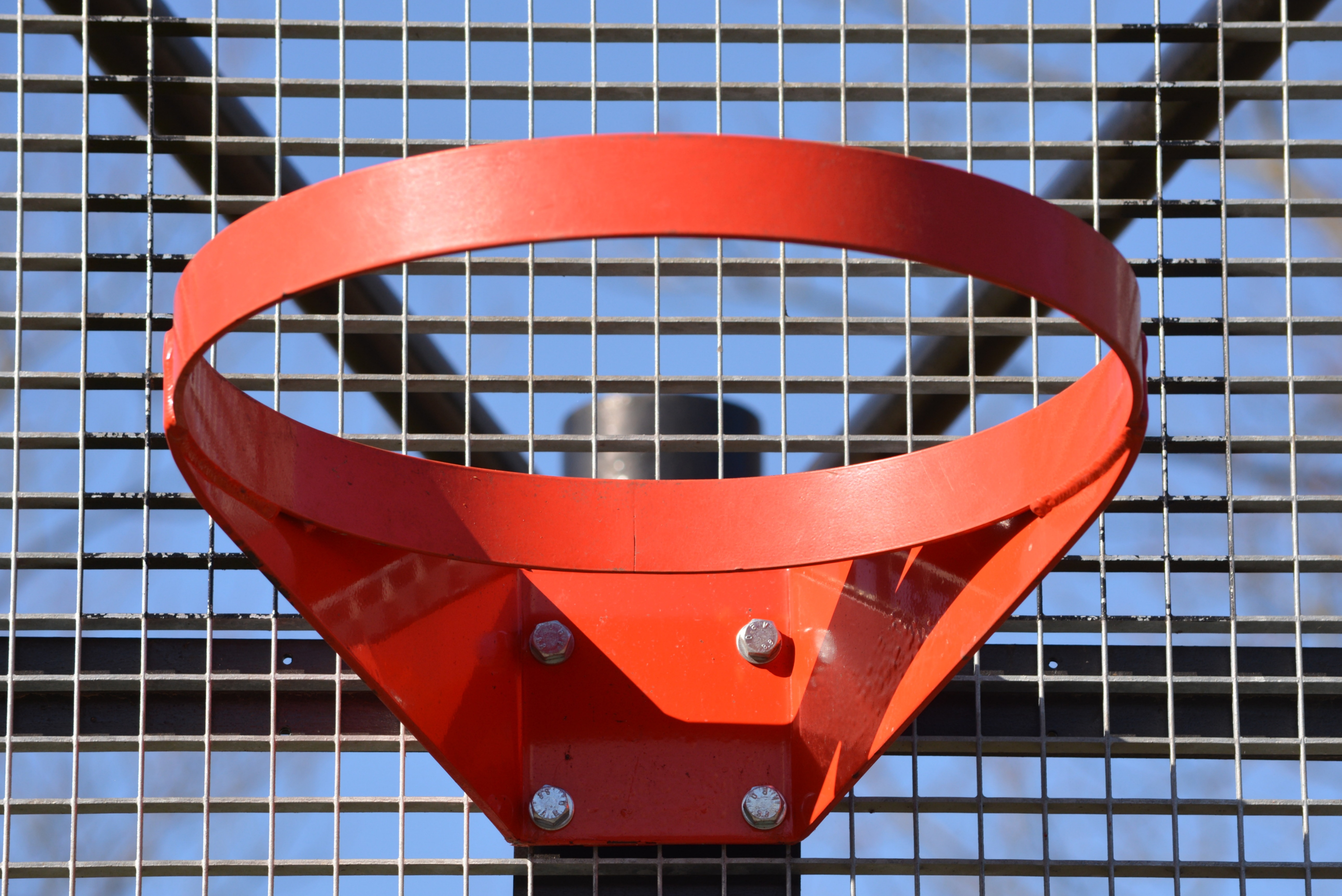 Red basketball hoop on the net close up free image download