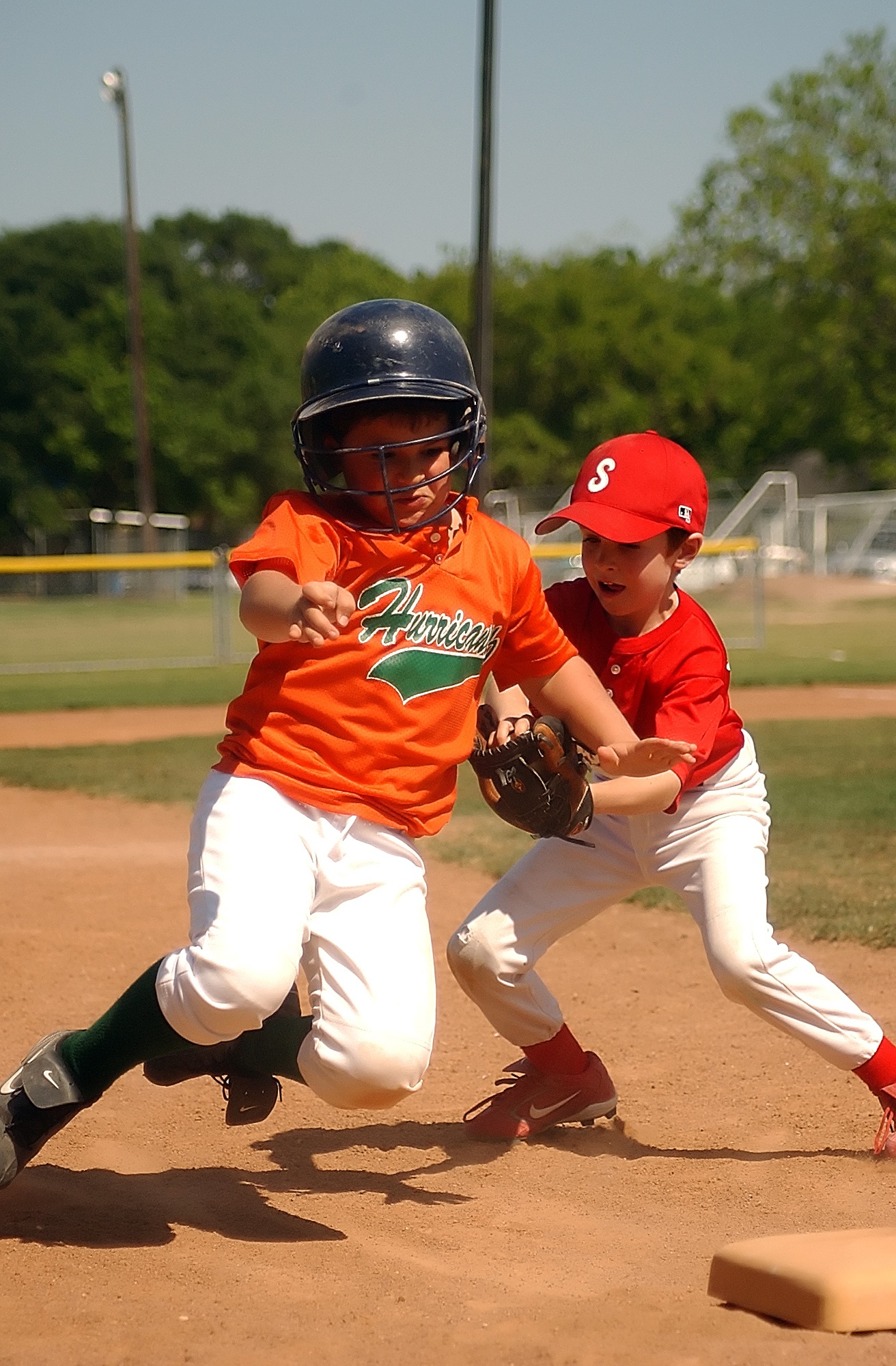 Junior league baseball in a game free image download