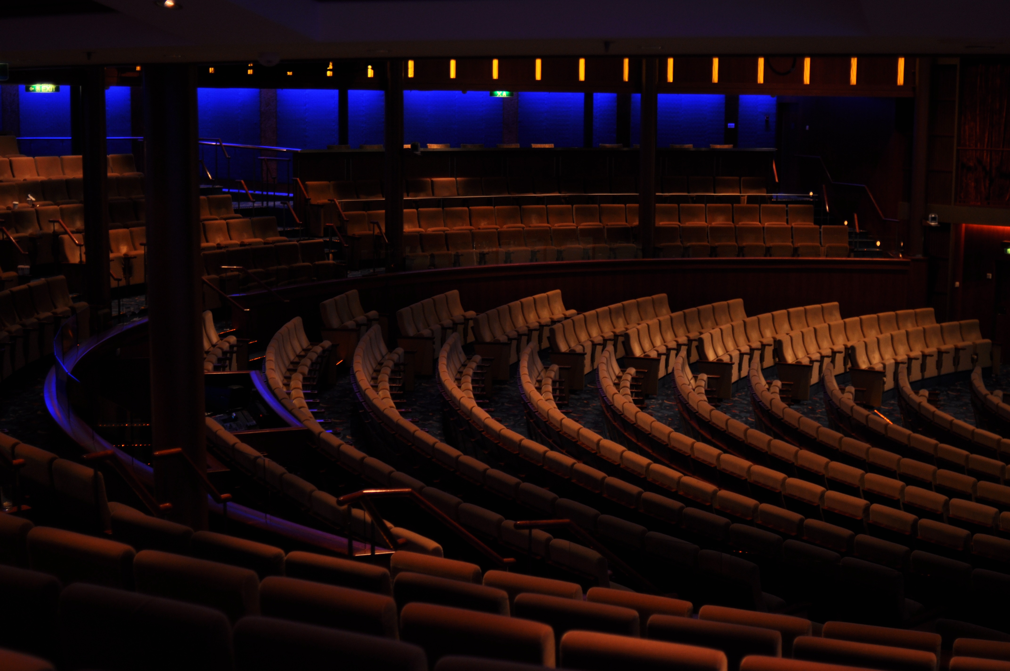 Chairs in a dark concert hall free image download