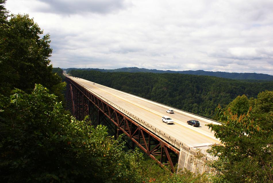 Steel arch of new river bridge above water, usa, west virginia free image download