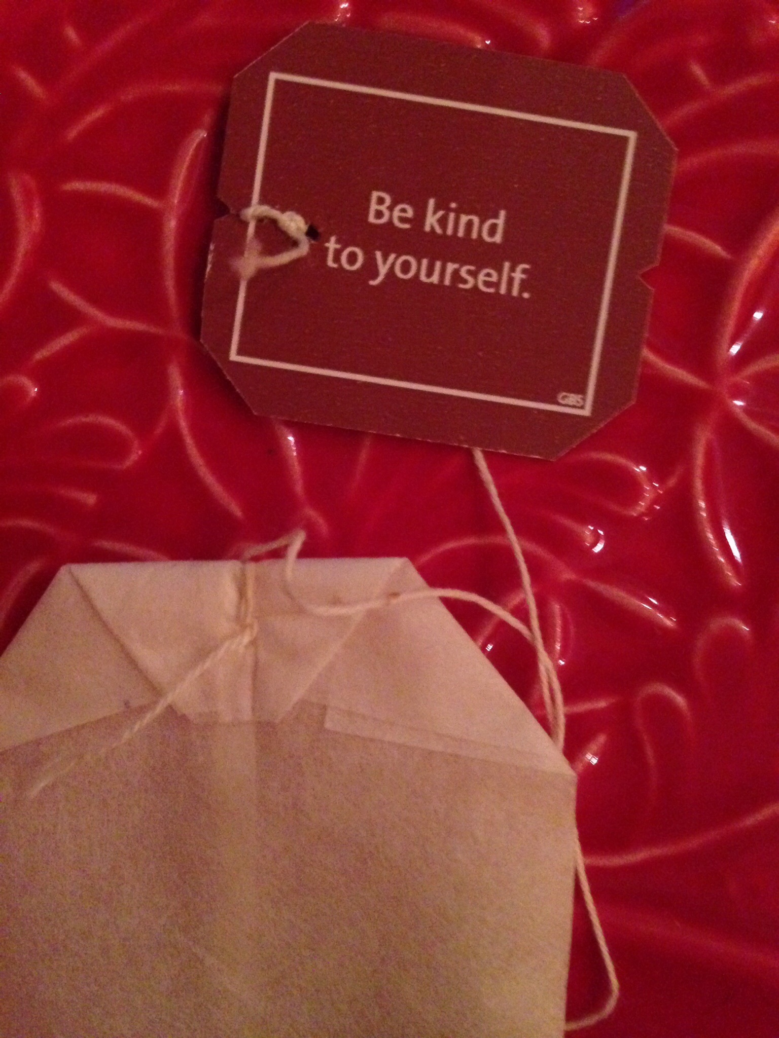 Tea bag with a red label free image download