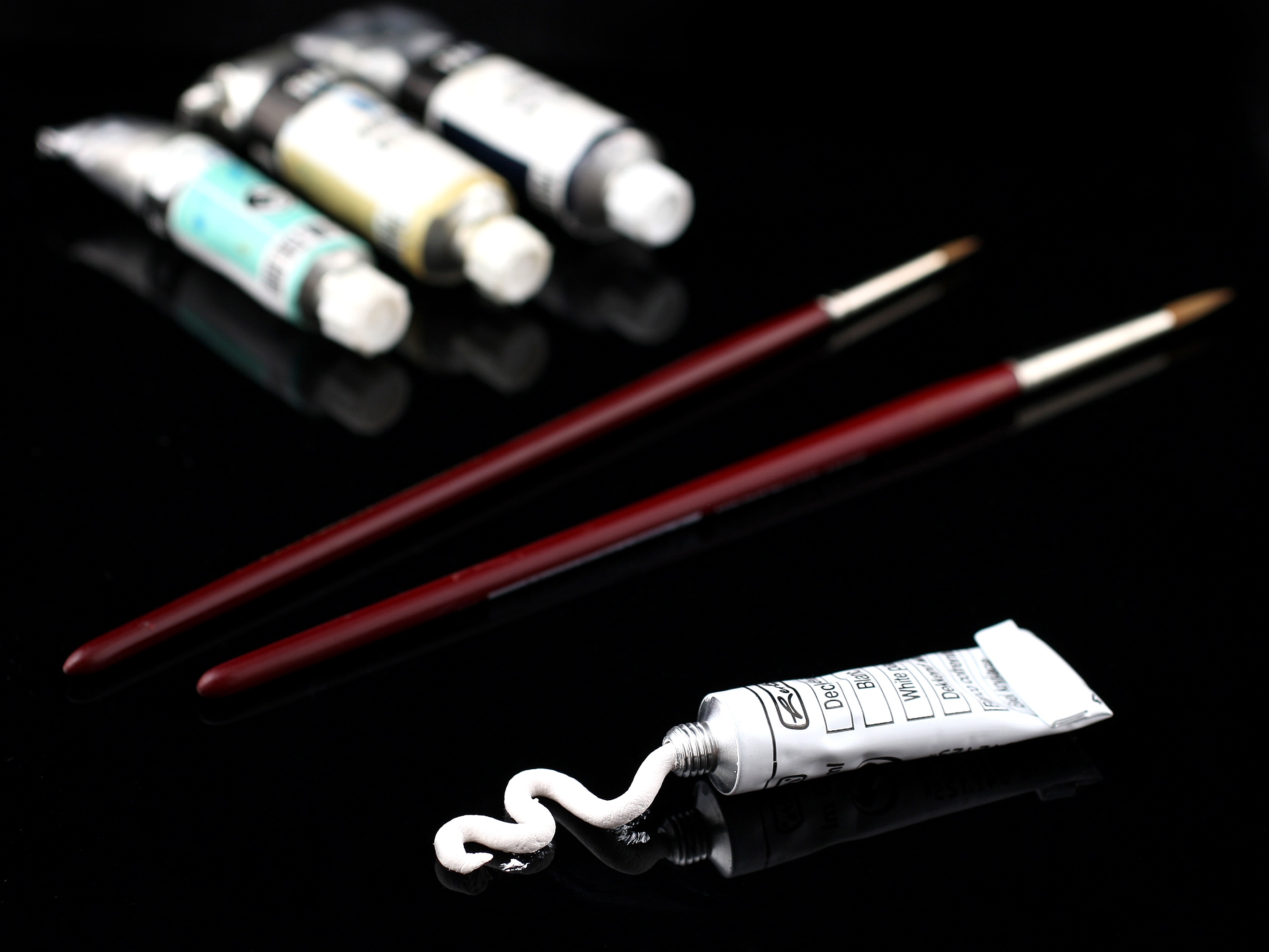 Paintbrushes paint table black free image download