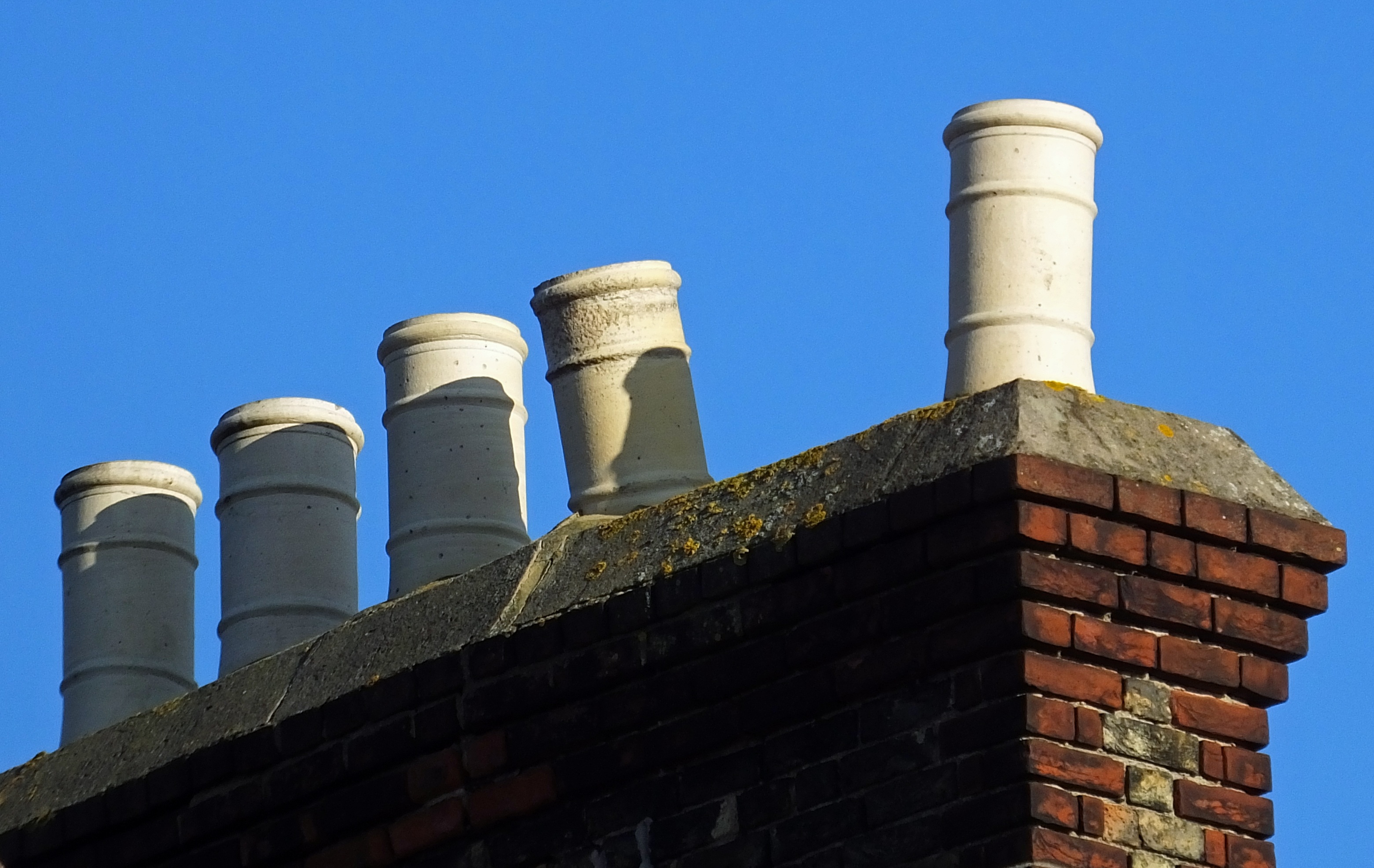 White pipes on the roof of the house free image download