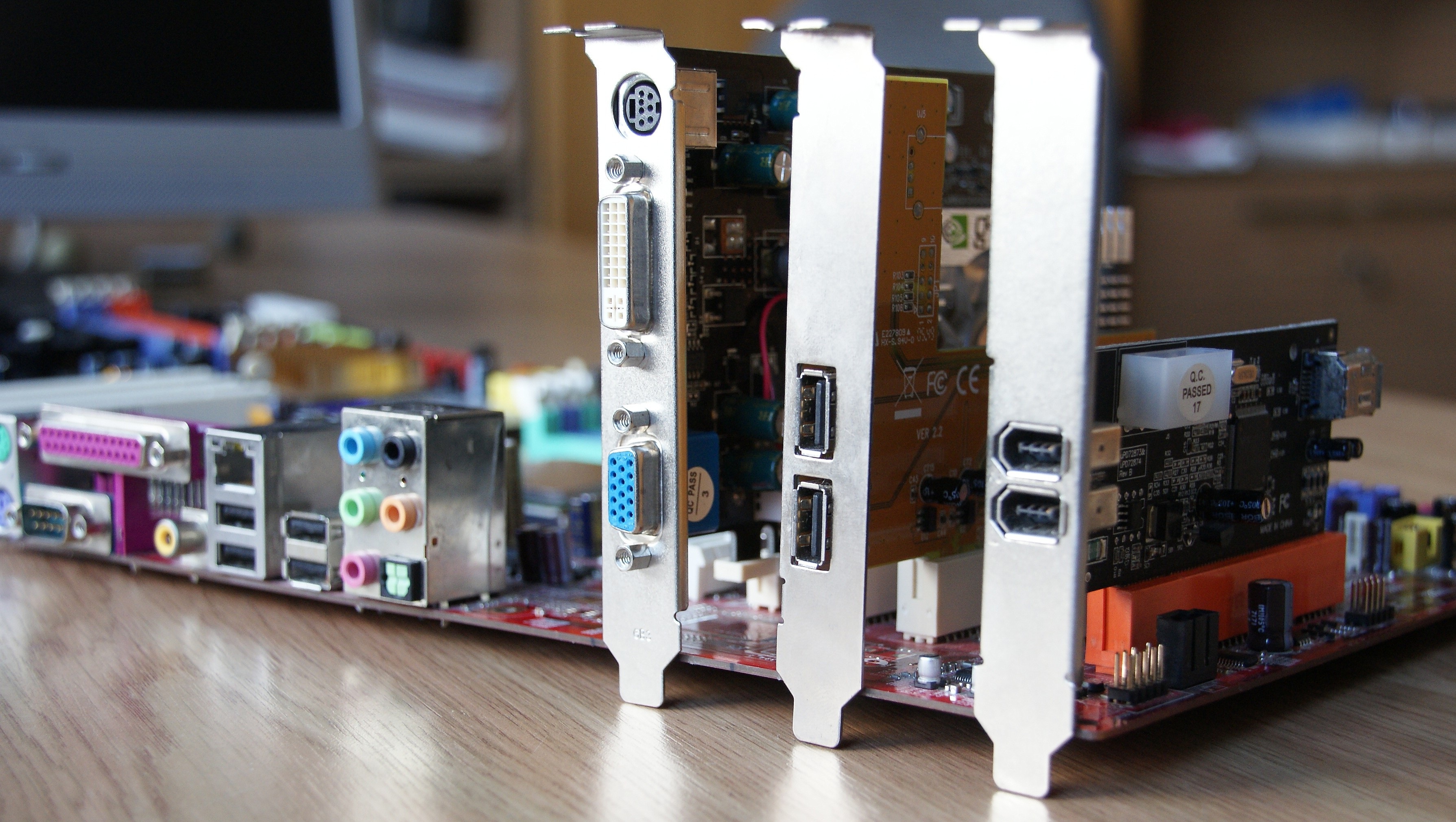 Three Expansion cards inserted in motherboard free image download