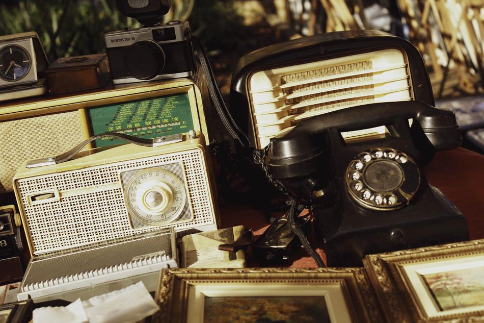 Retro telephone and radio at a flea market free image download