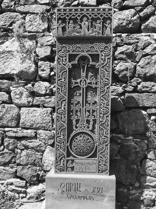 Ancient stone monument with a cross pattern free image download