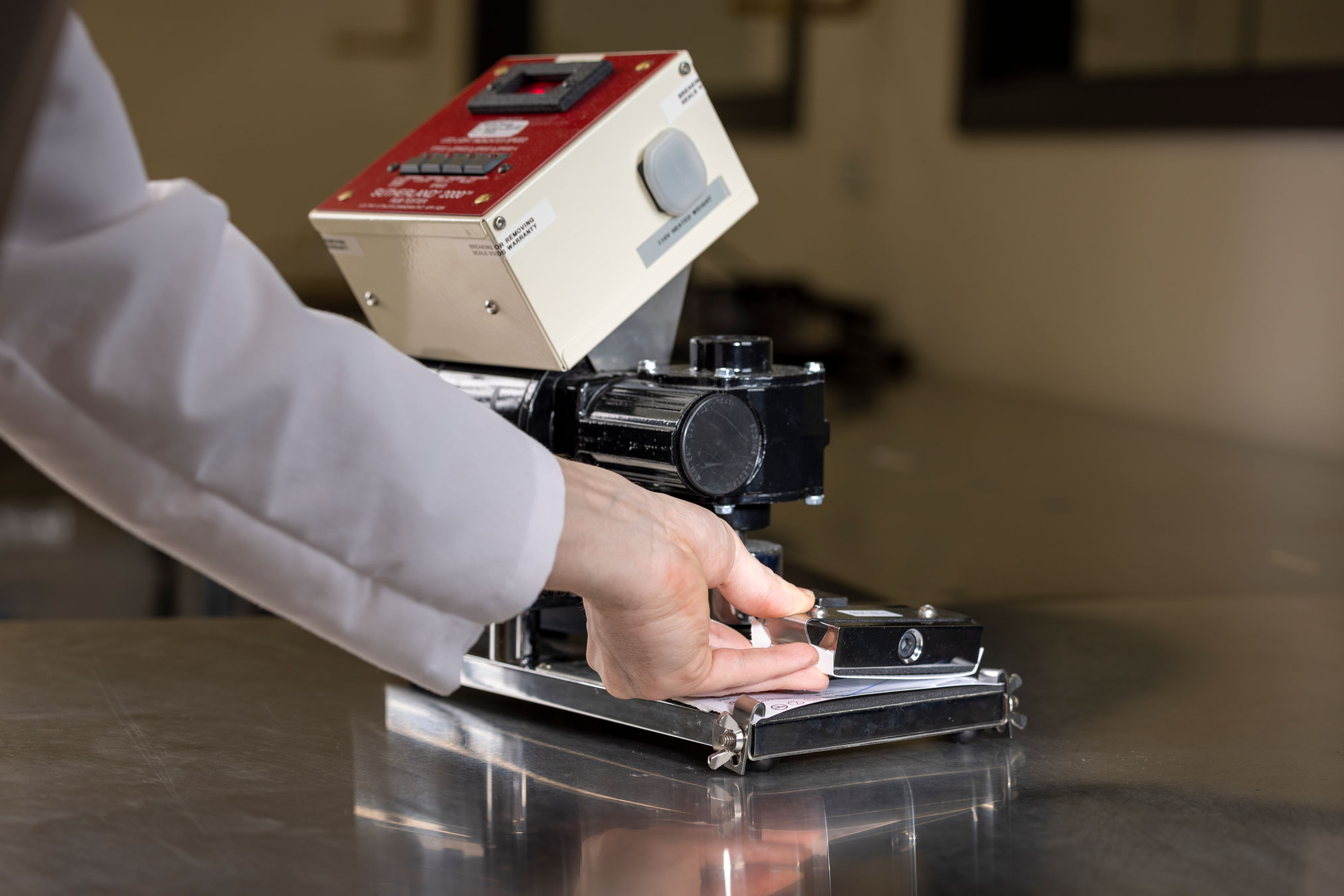 The Sutherland Rub Test ASTM D5264 Packaging Compliance Labs