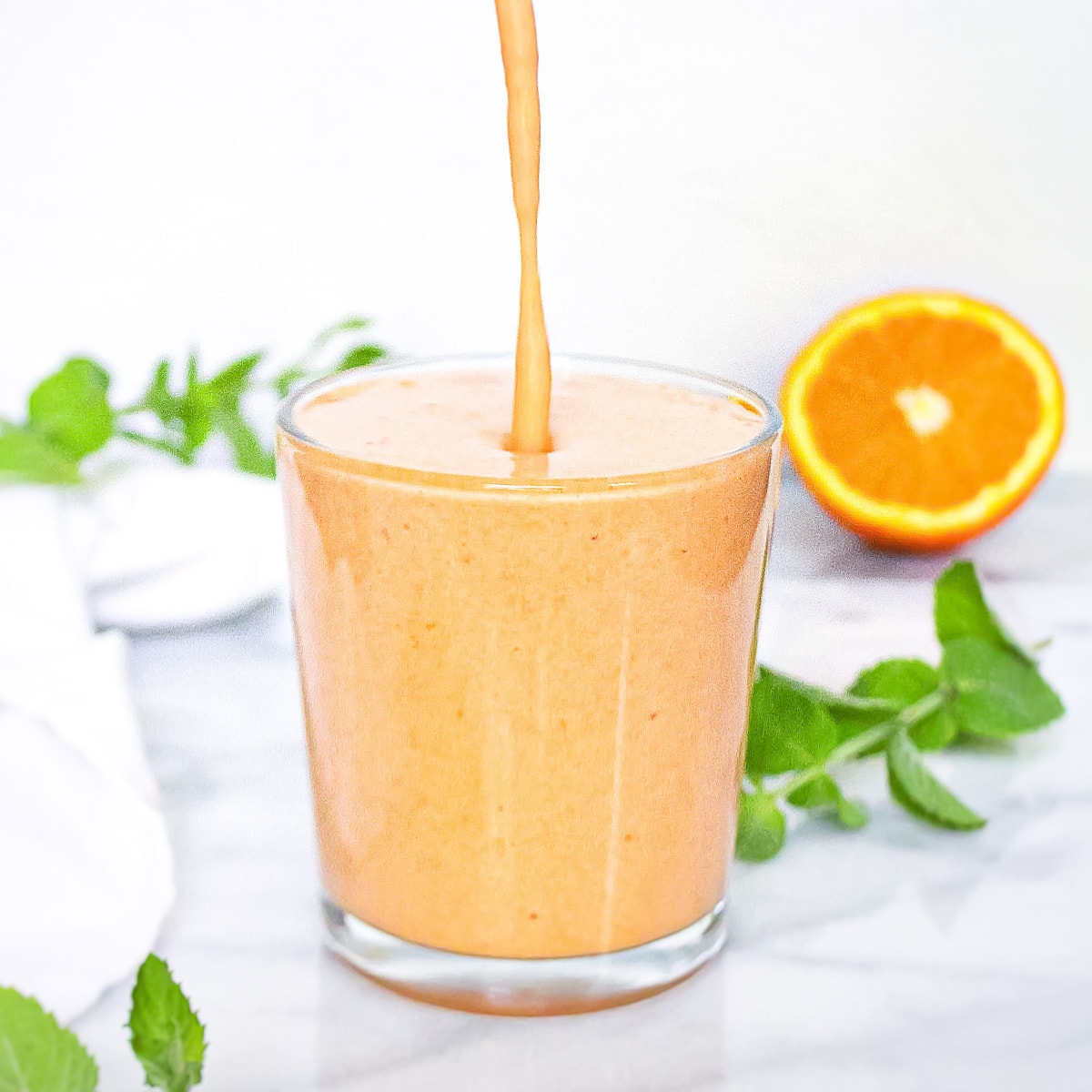 Orange Smoothie Planted in the Kitchen