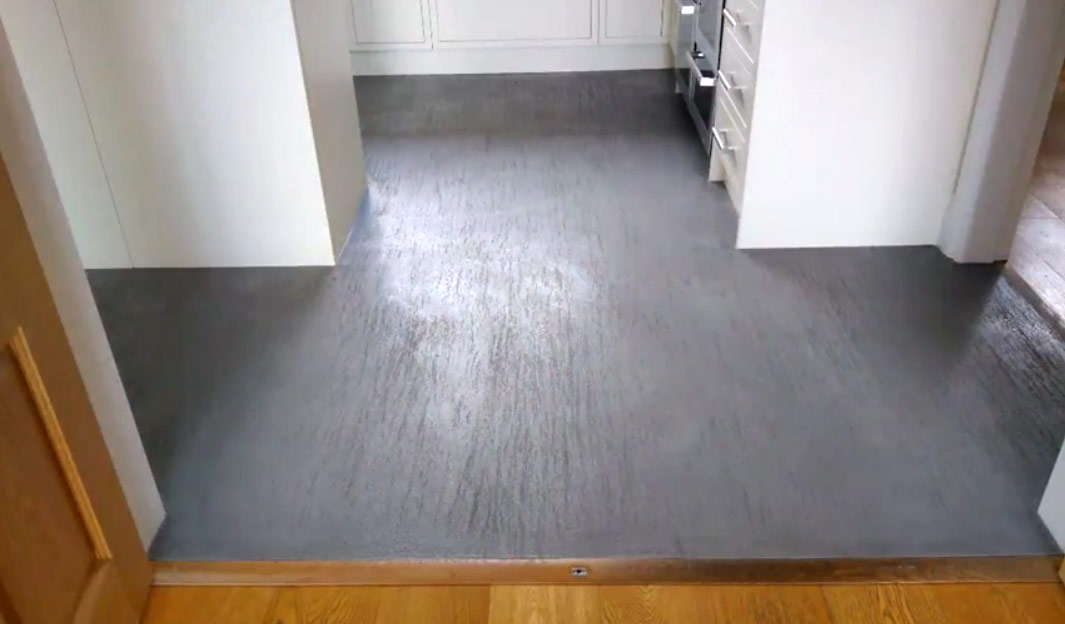 Microcement Plastmatta MicroCement floor with travertine finish Plaster Company