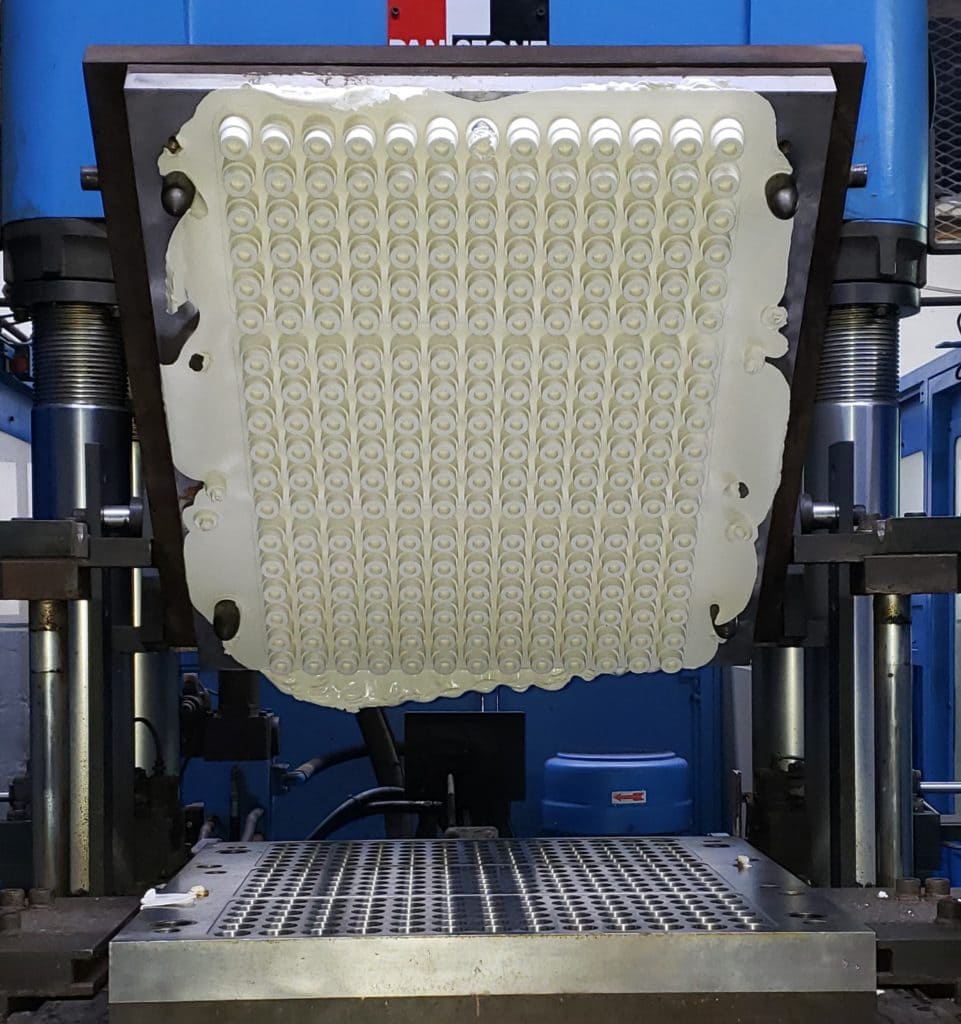 Compression molding Plasticoid Company