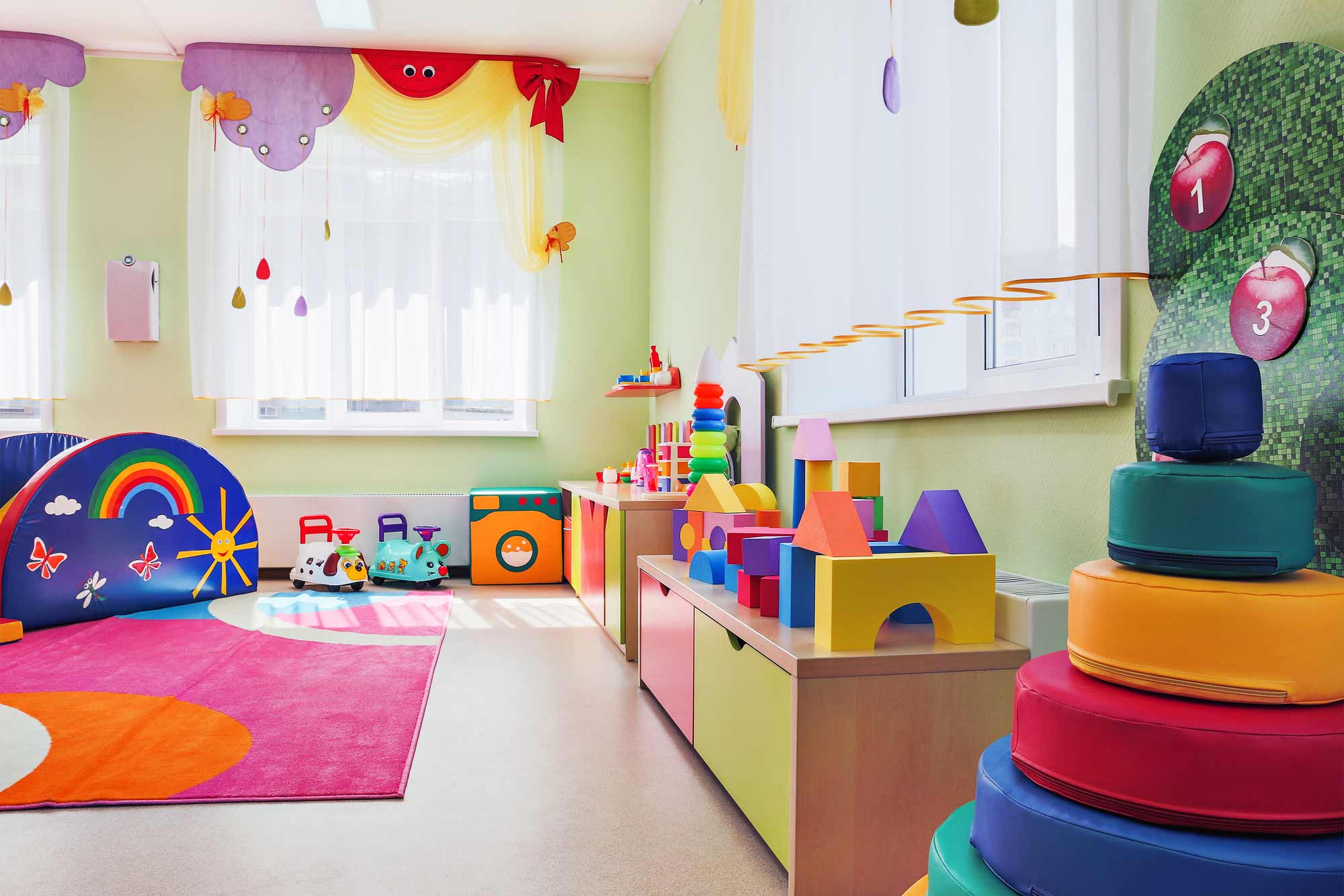 daycare center interior filled with toys Playspace Design